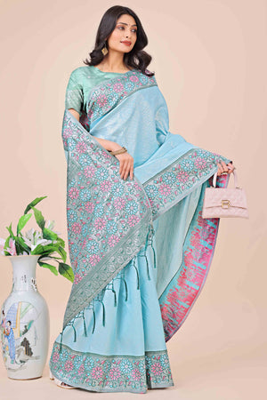 Light Blue Lichi Silk Blend Saree With Exquisite Floral Weaving & Graceful Tassel Details