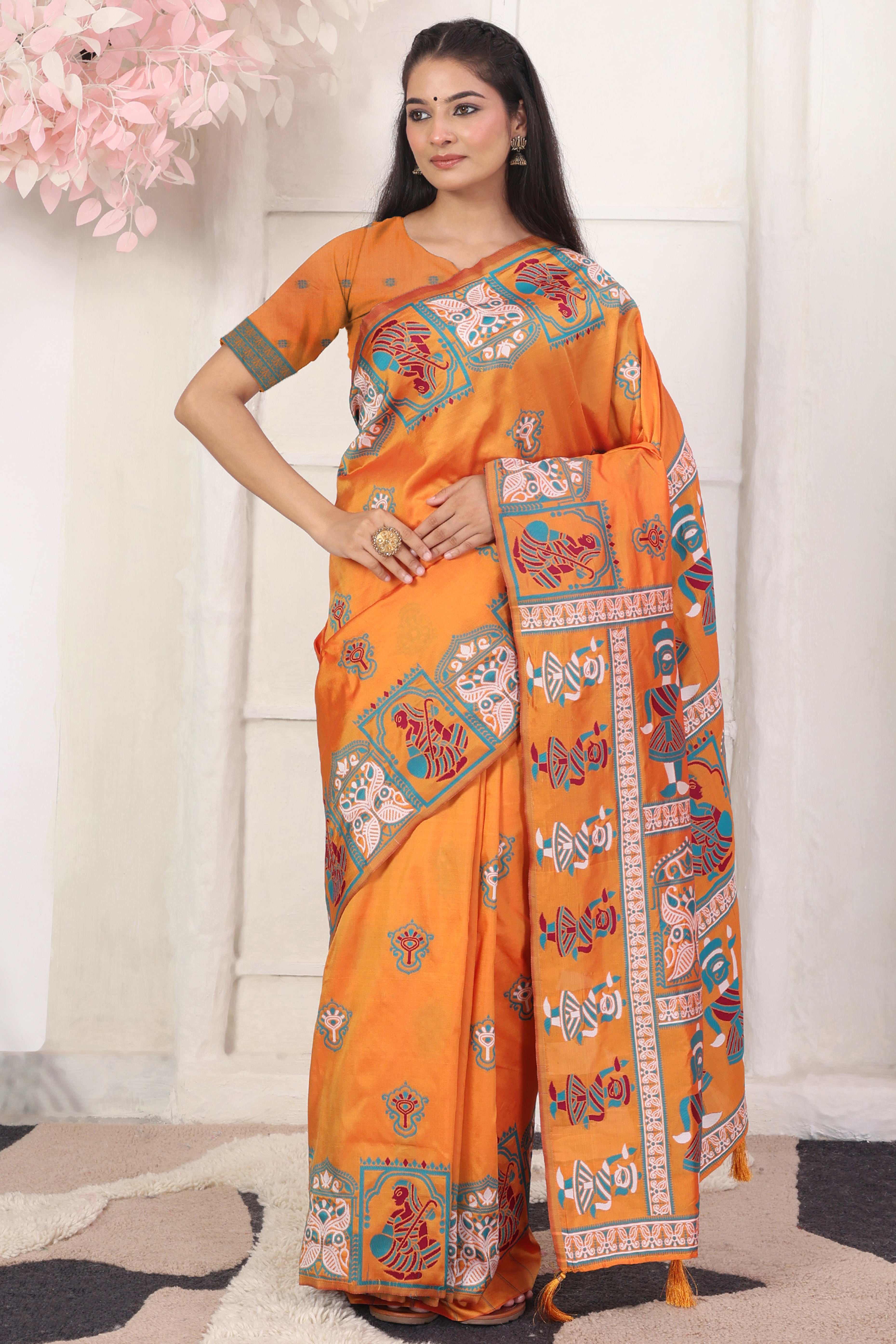 Orange Ethnic Madhubani Print Silk Blend Saree Enhanced With Tassel Pallu Accents