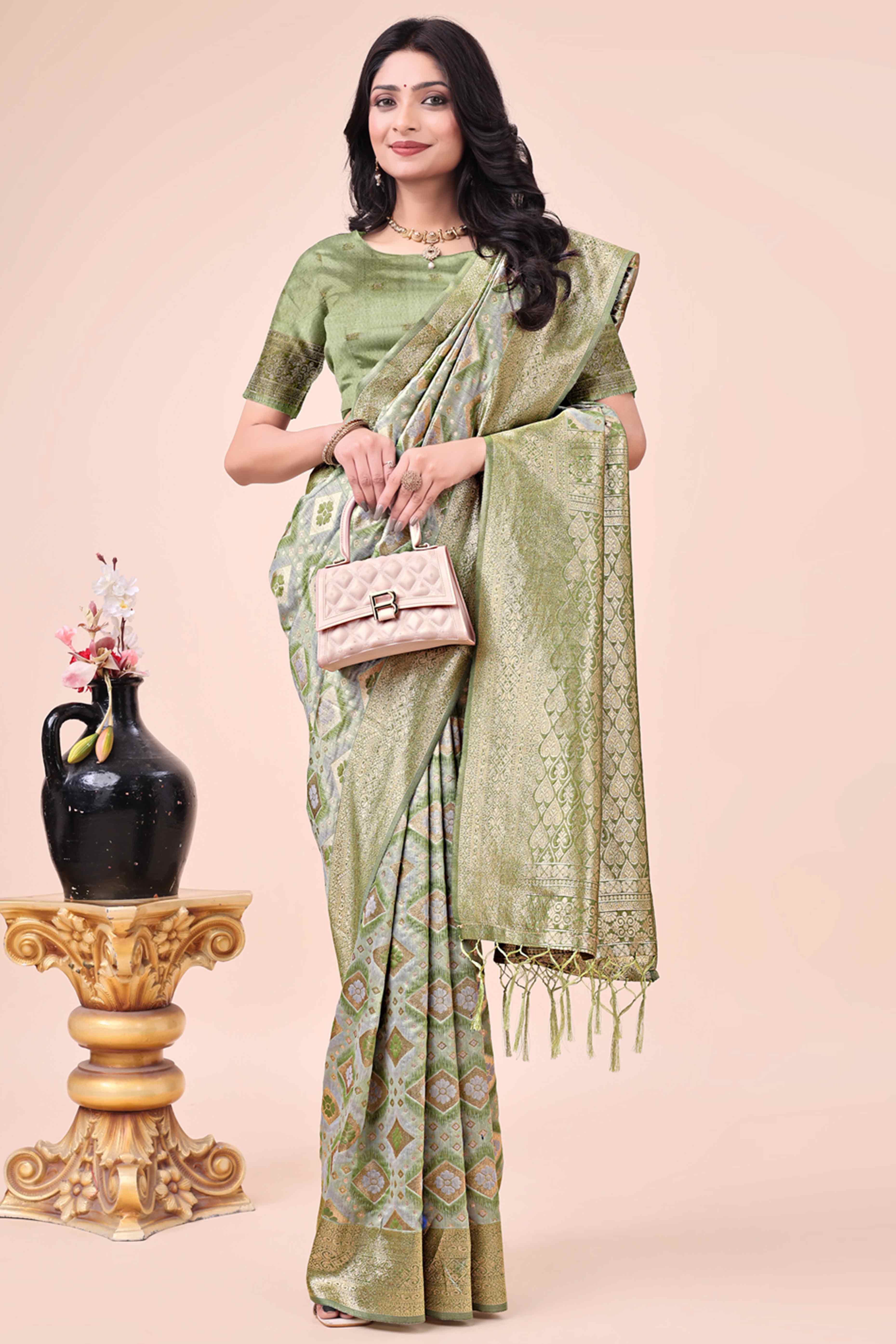 Floral Weaving On Mehendi Green Cotton Blend Saree With Tassels