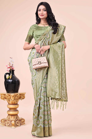 Floral Weaving On Mehendi Green Cotton Blend Saree With Tassels