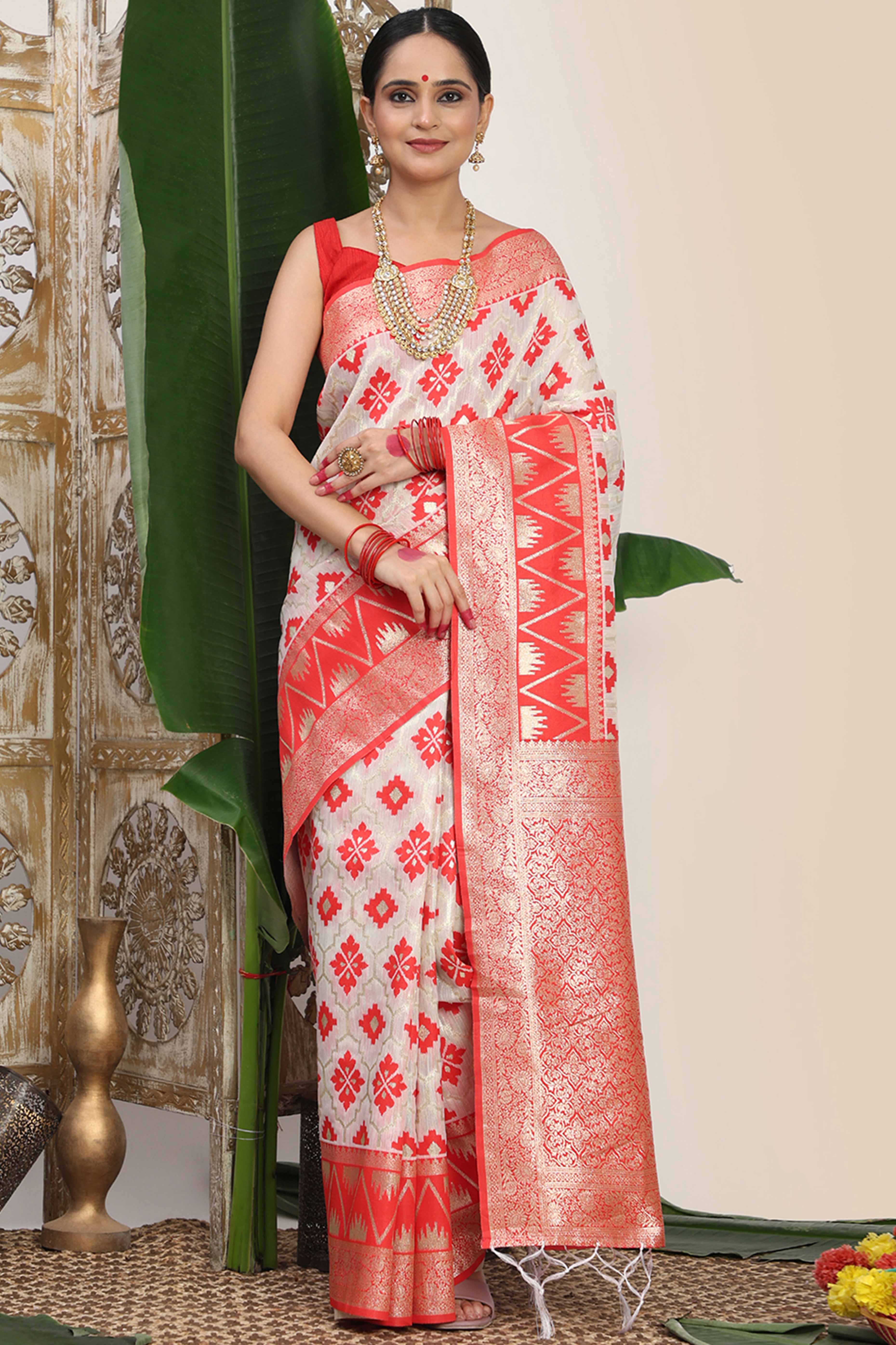 Vibrant White & Red Linen Cotton Saree Featuring Timeless Zari Weaving And Elegant Tassel Pallu