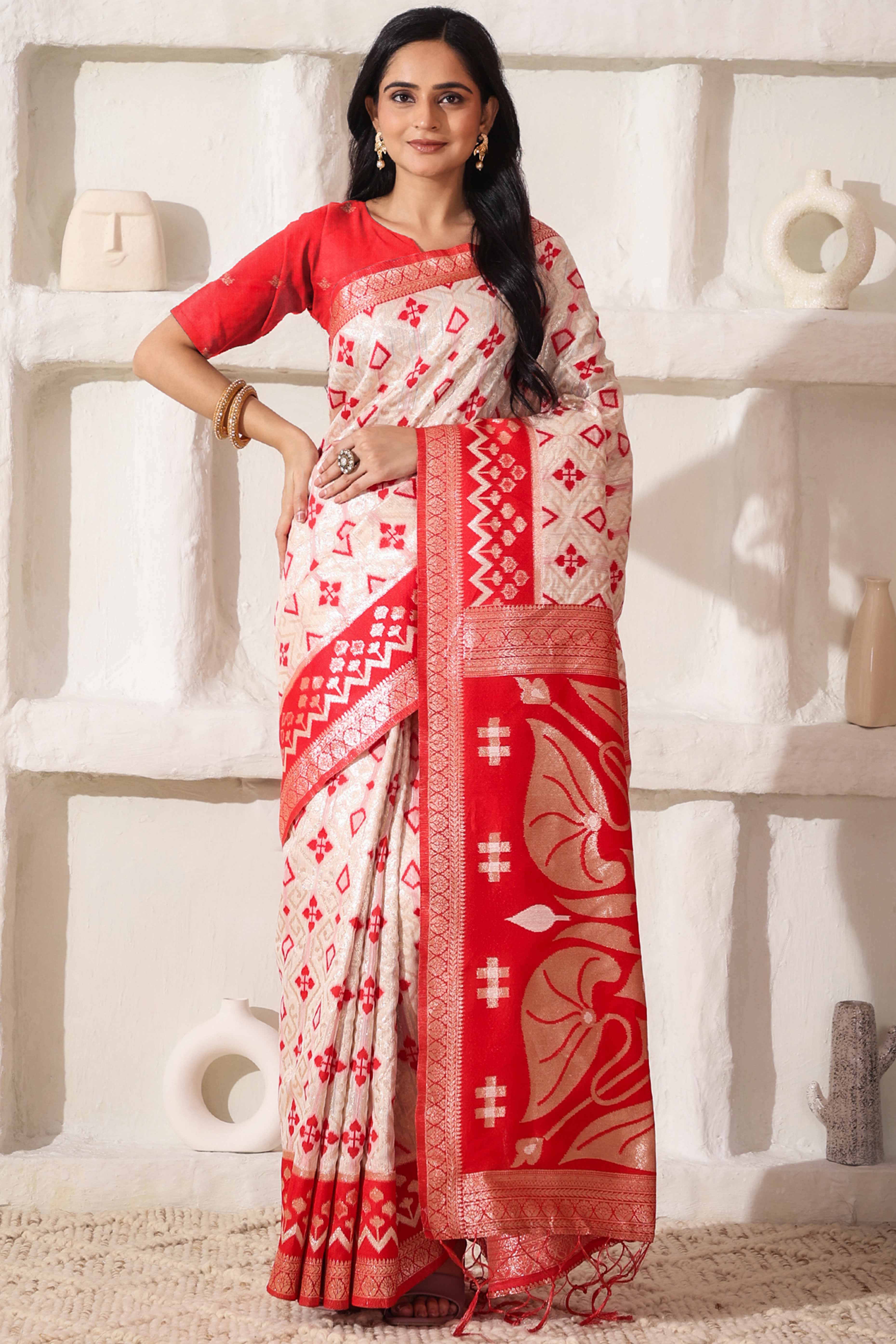 Graceful White & Red Saree In Linen Cotton With Fine Zari Weaving And Flowing Tassel Details