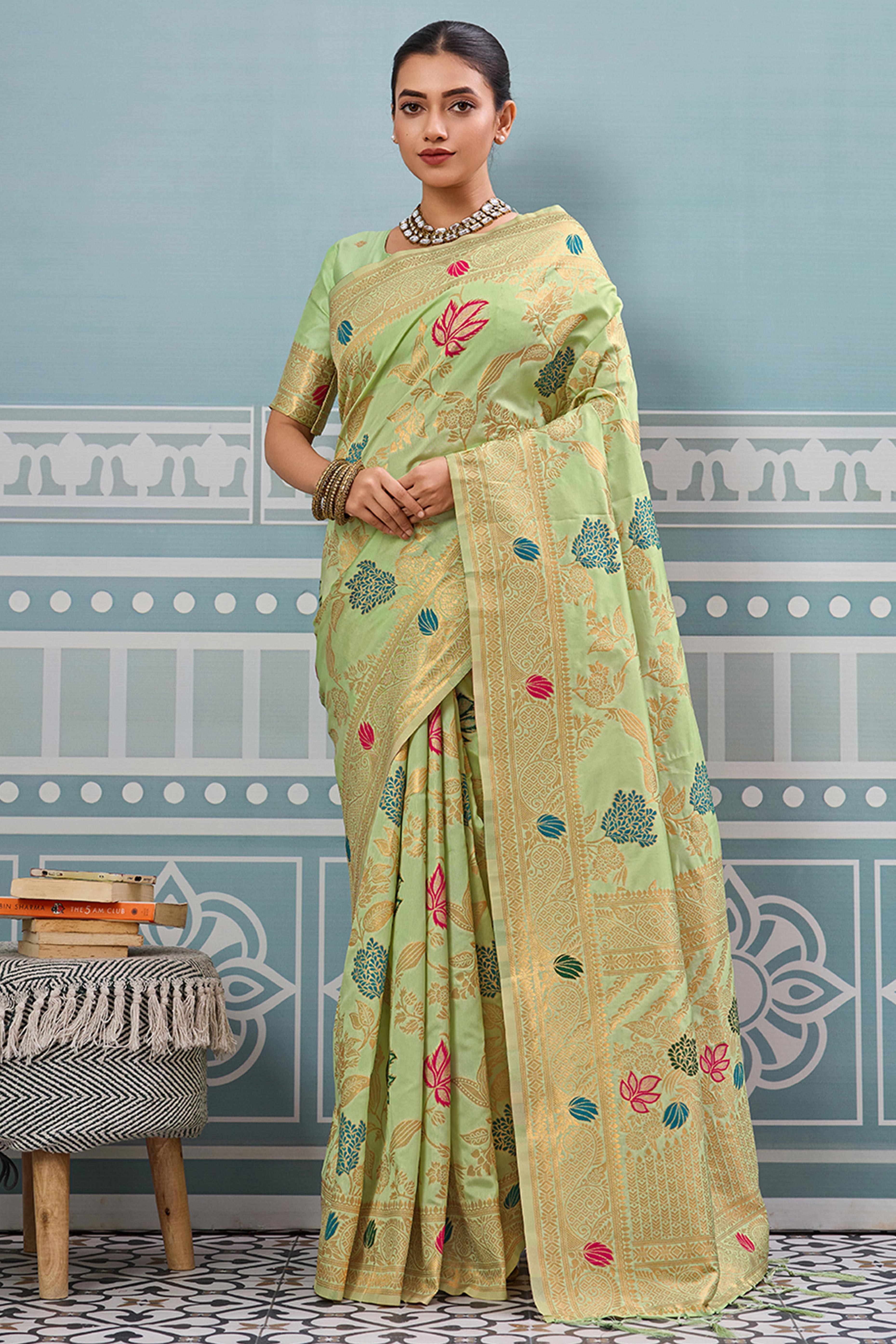 Radiant Pista Green Silk Blend Saree Adorned With Intricate Floral Zari Weaving & Tassel Pallu