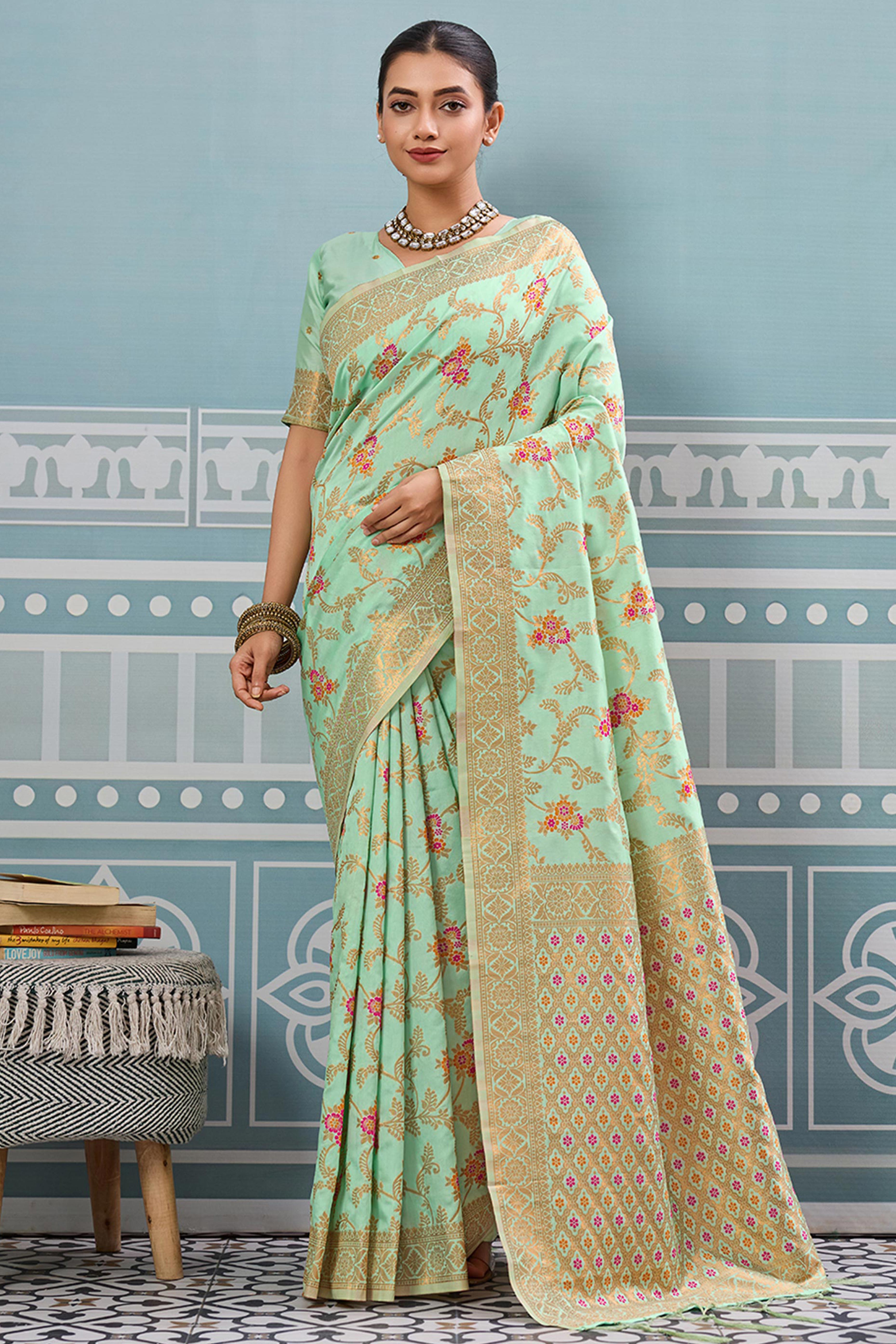 Majestic Bloom Sea Green Floral Zari Weaving Silk Blend Saree With Elegant Tassel Pallu