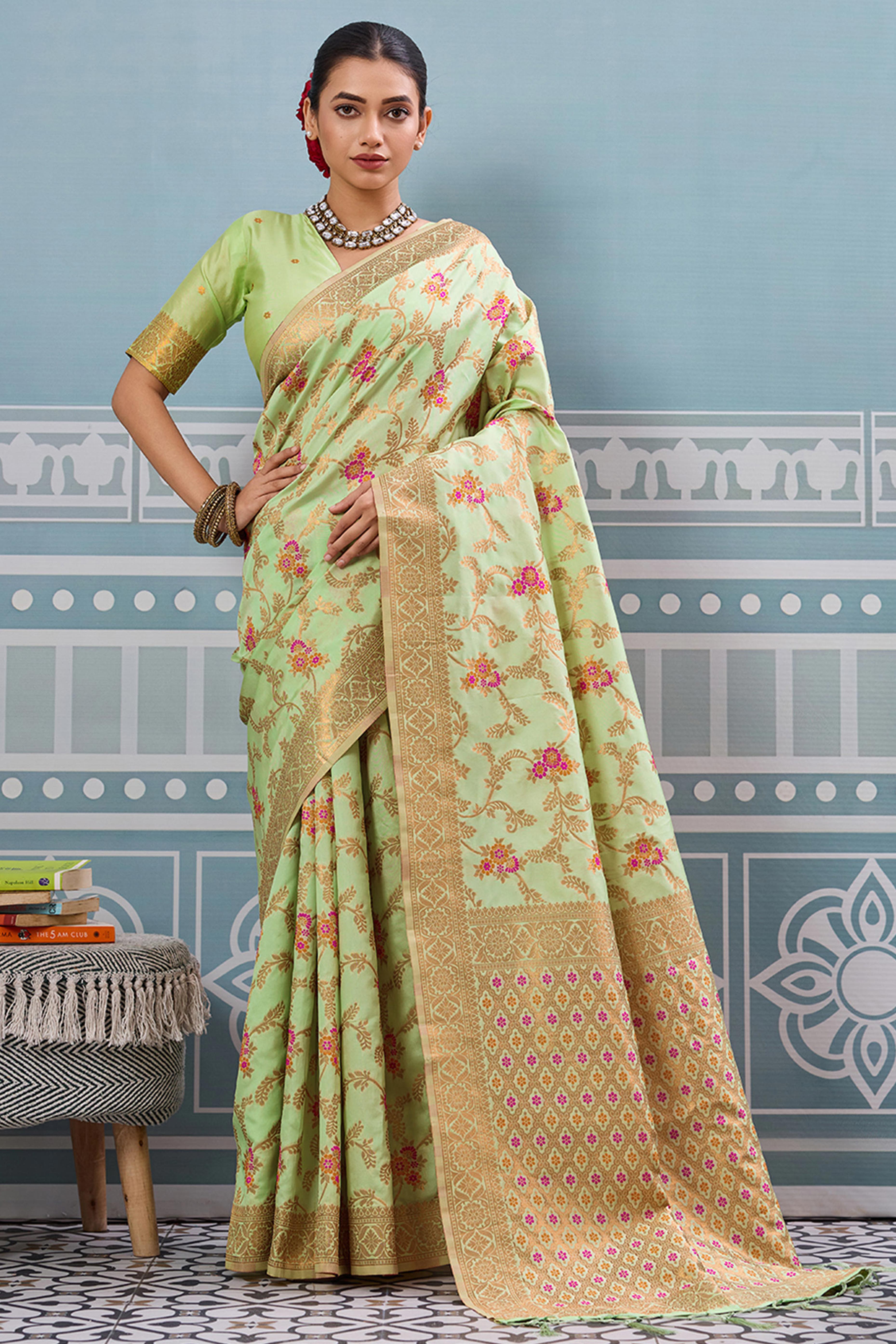 Majestic Bloom Pista Green Floral Zari Weaving Silk Blend Saree With Elegant Tassel Pallu