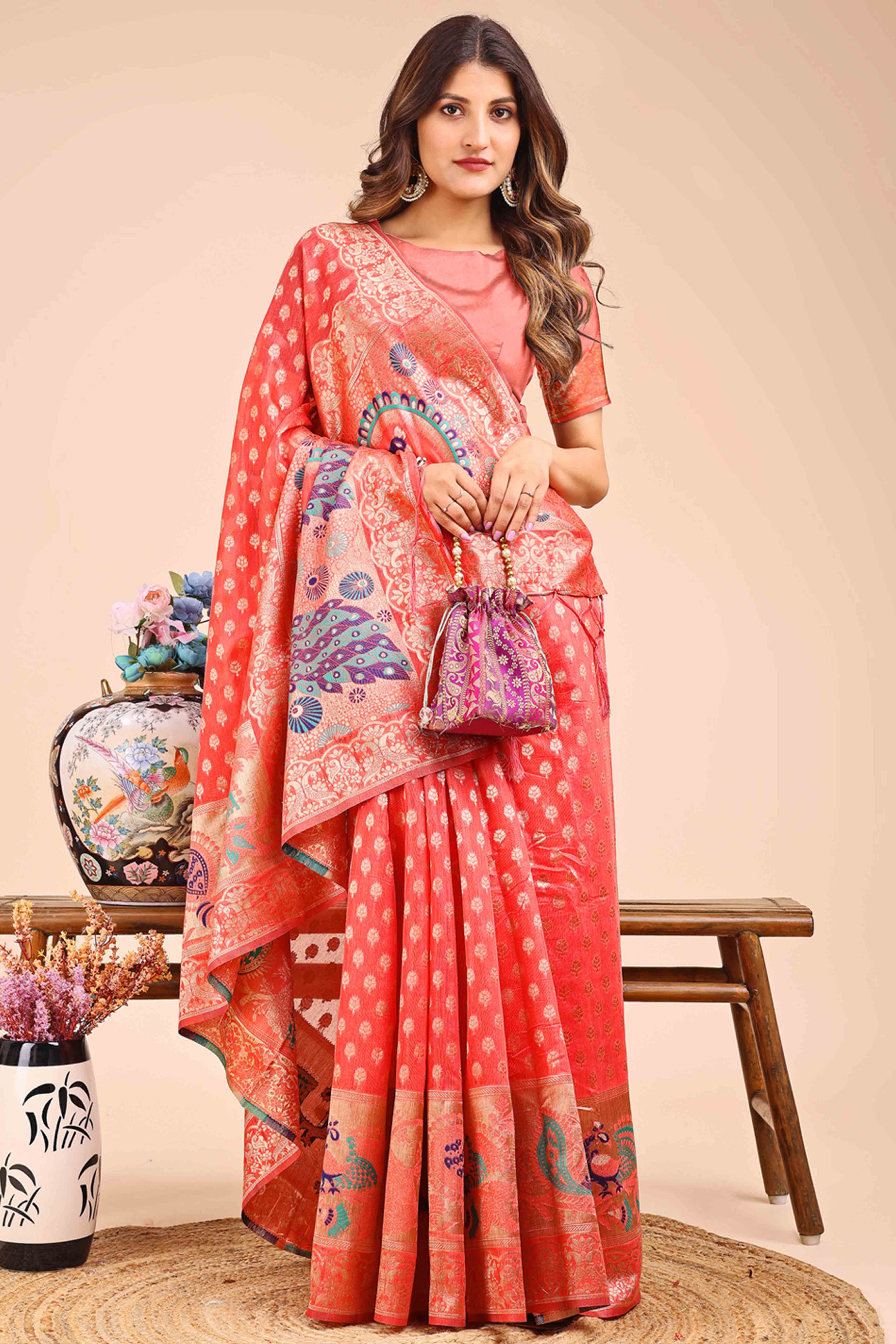 Coral Red Floral Zari Weaving Embellished Linen Cotton Saree With Tassel Accents