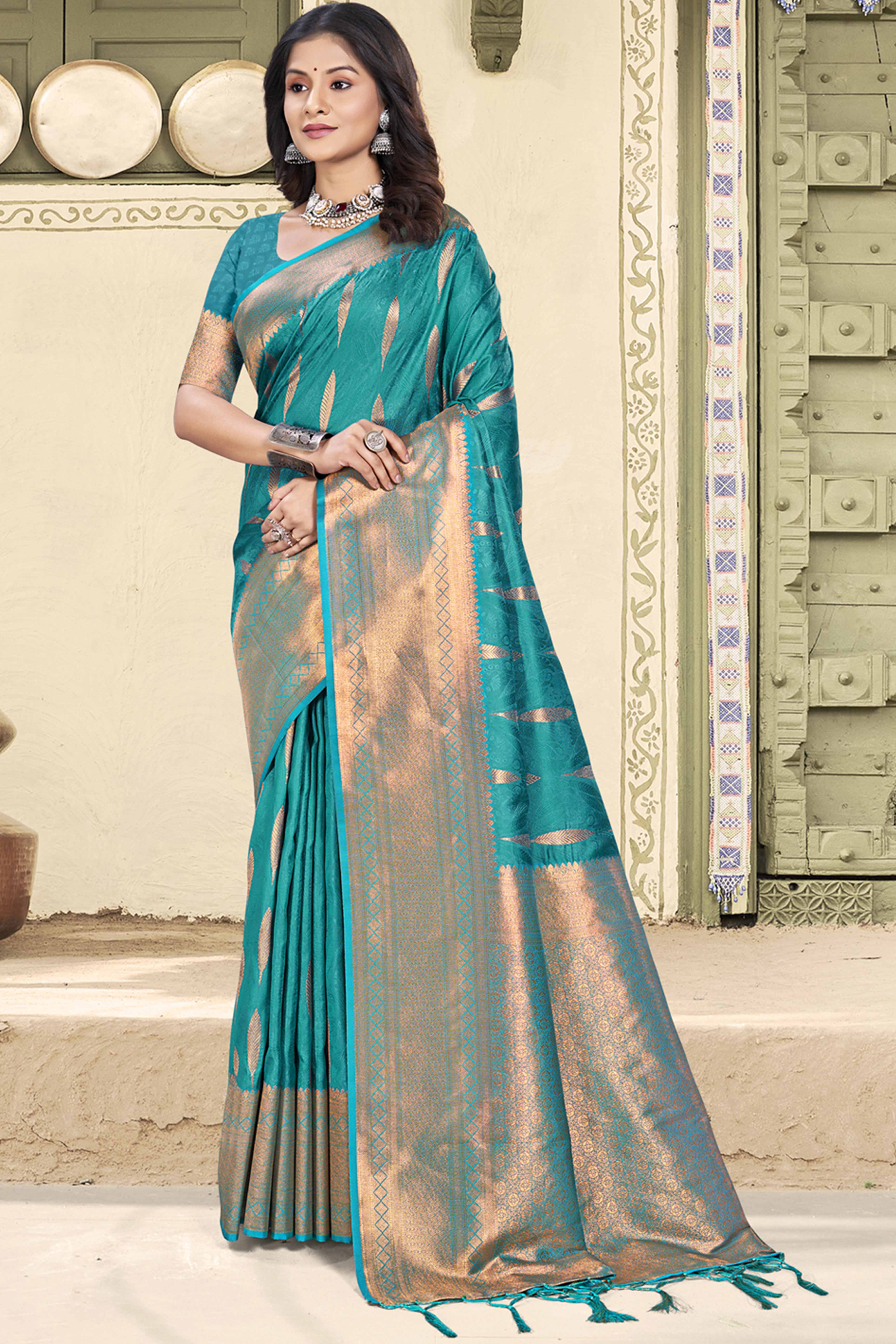 Regal Teal Blue Silk Blend Saree Enhanced With Floral Zari Work & Tassel Finish