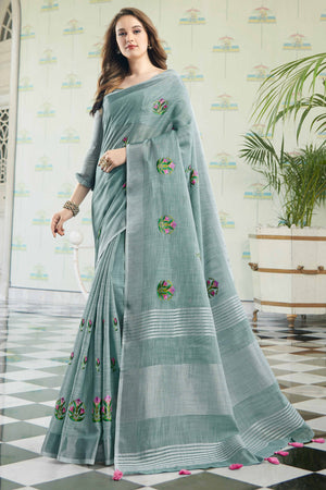 Sea Green Linen Saree with Intricate Floral Embroidery and Classic Weaving
