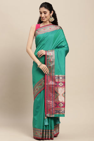 Graceful Rama Green Solid Saree Highlighted With Floral Zari Weaving On Silk Blend & Tassel Pallu