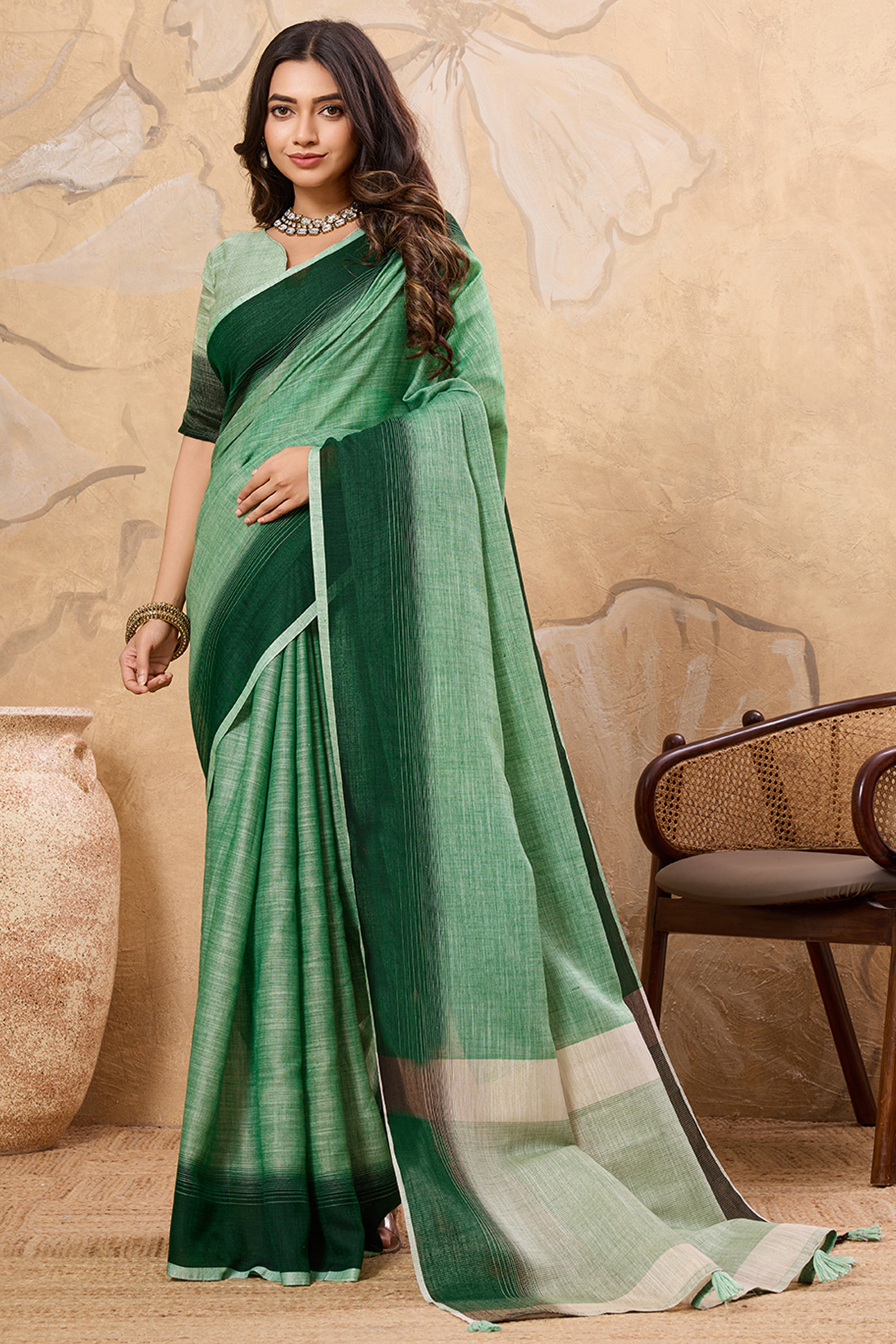 Stylish Green Linen Saree With Zari Weaving Work & Tassel Pallu Charm