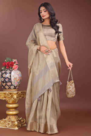 Beige Solid With Zari Woven Organza Saree With Tassel Border