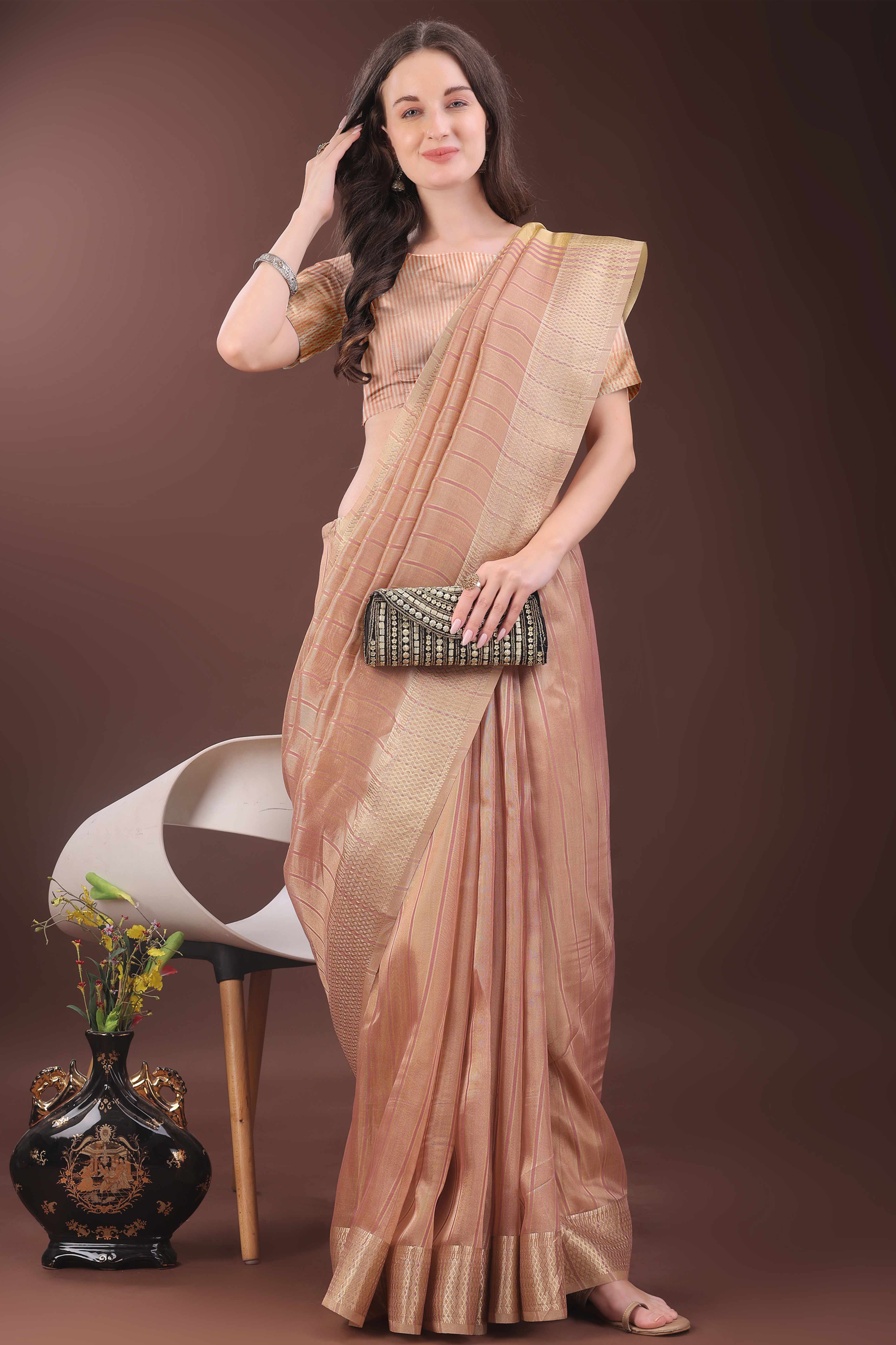 Peach Organza Saree With Zari Woven Stripes & Elegant Tassel Border