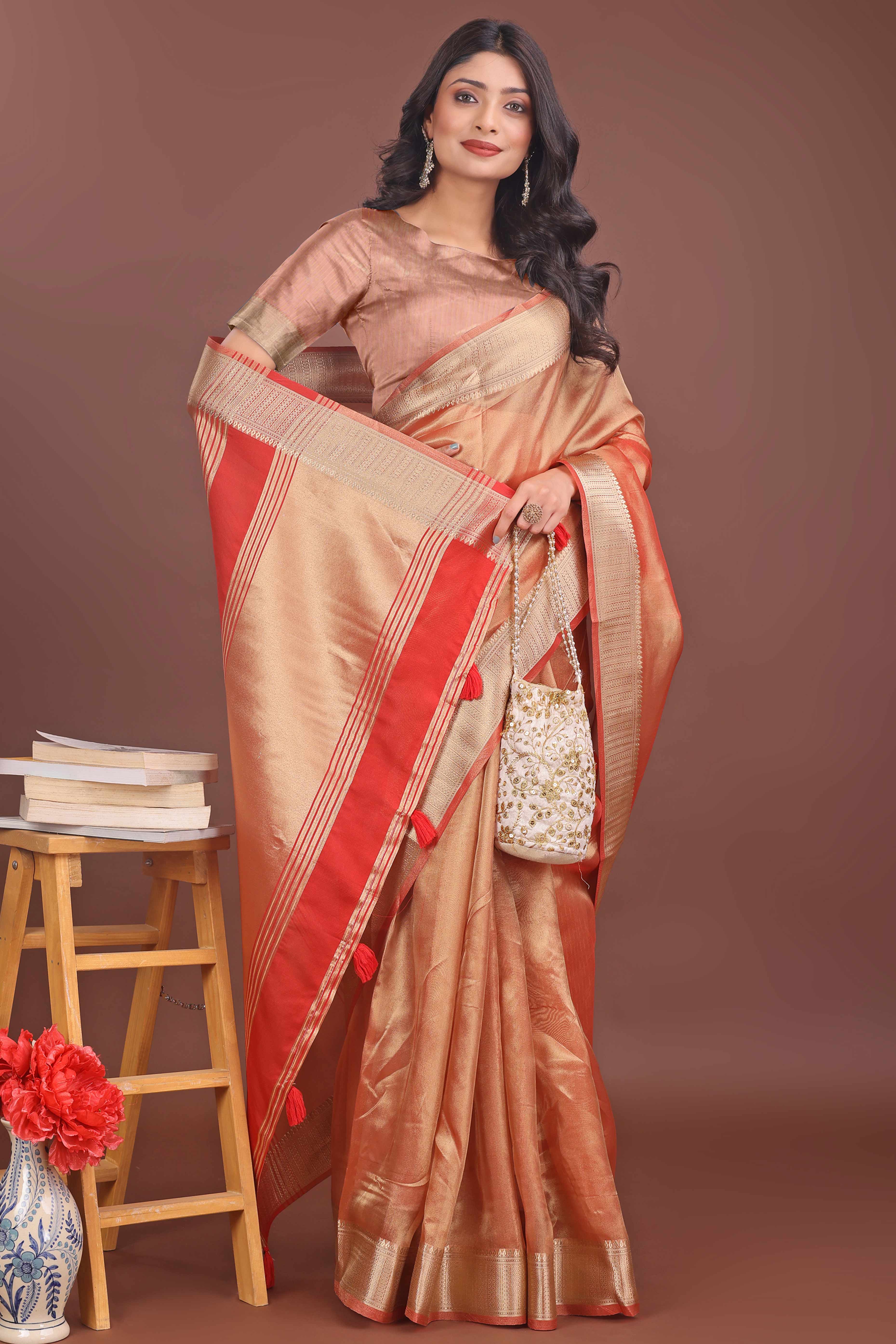 Light Orange Organza Solid Saree With Lustrous Zari Weave &  Delicate Tassels