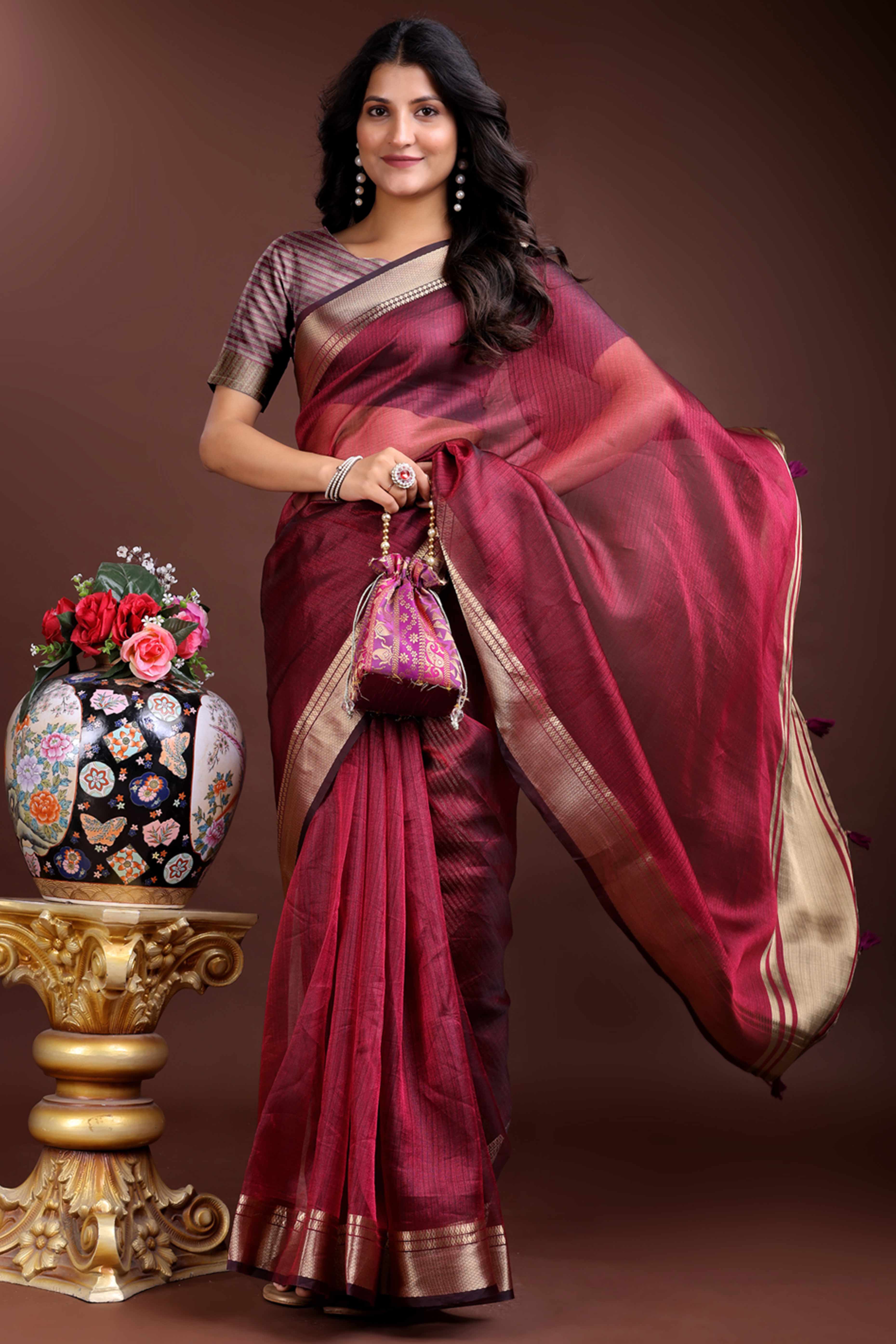 Magenta Organza Saree with Zari Border Weaving Sophistication