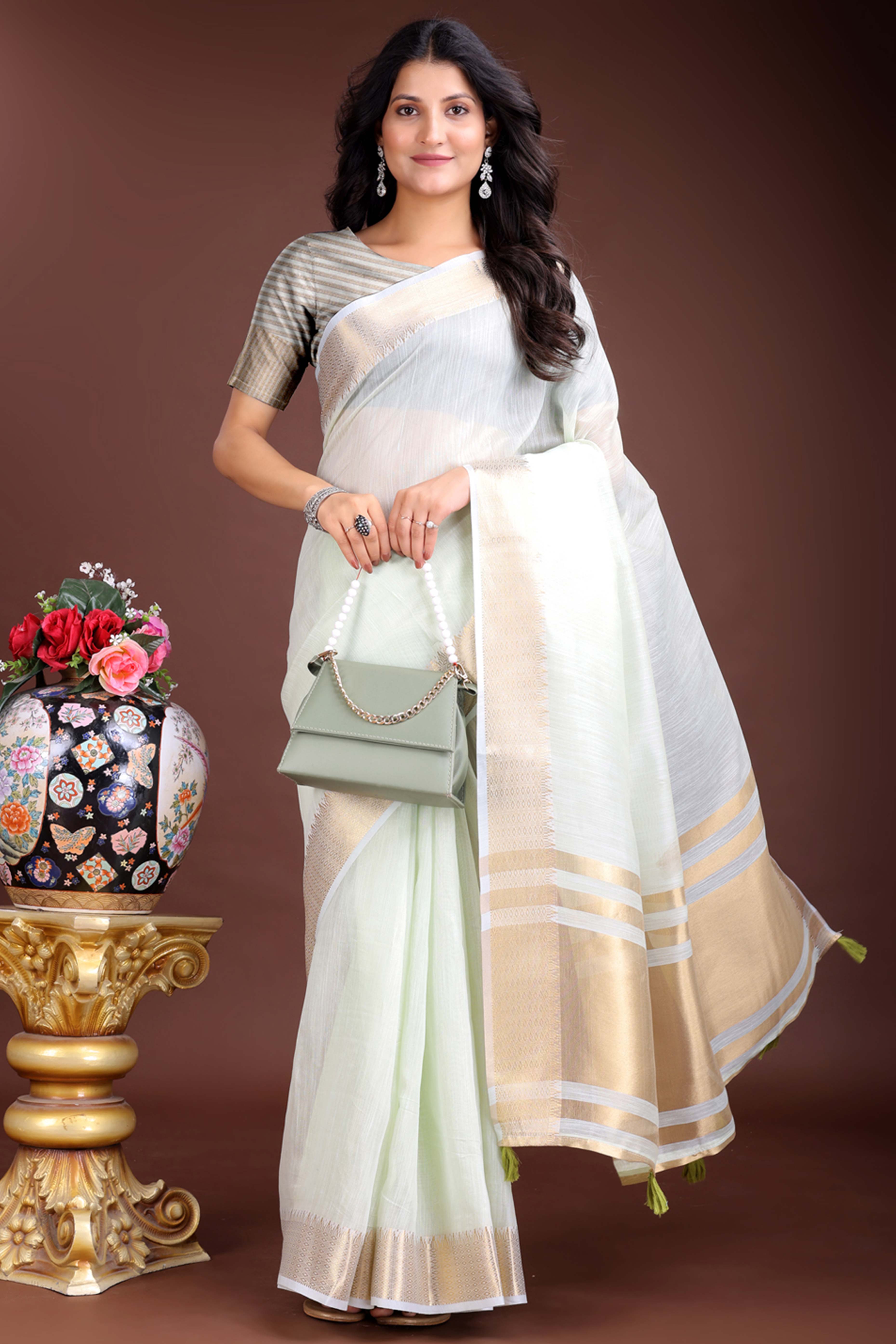 Light Green Cotton Silk Saree with Zari Border Weaving