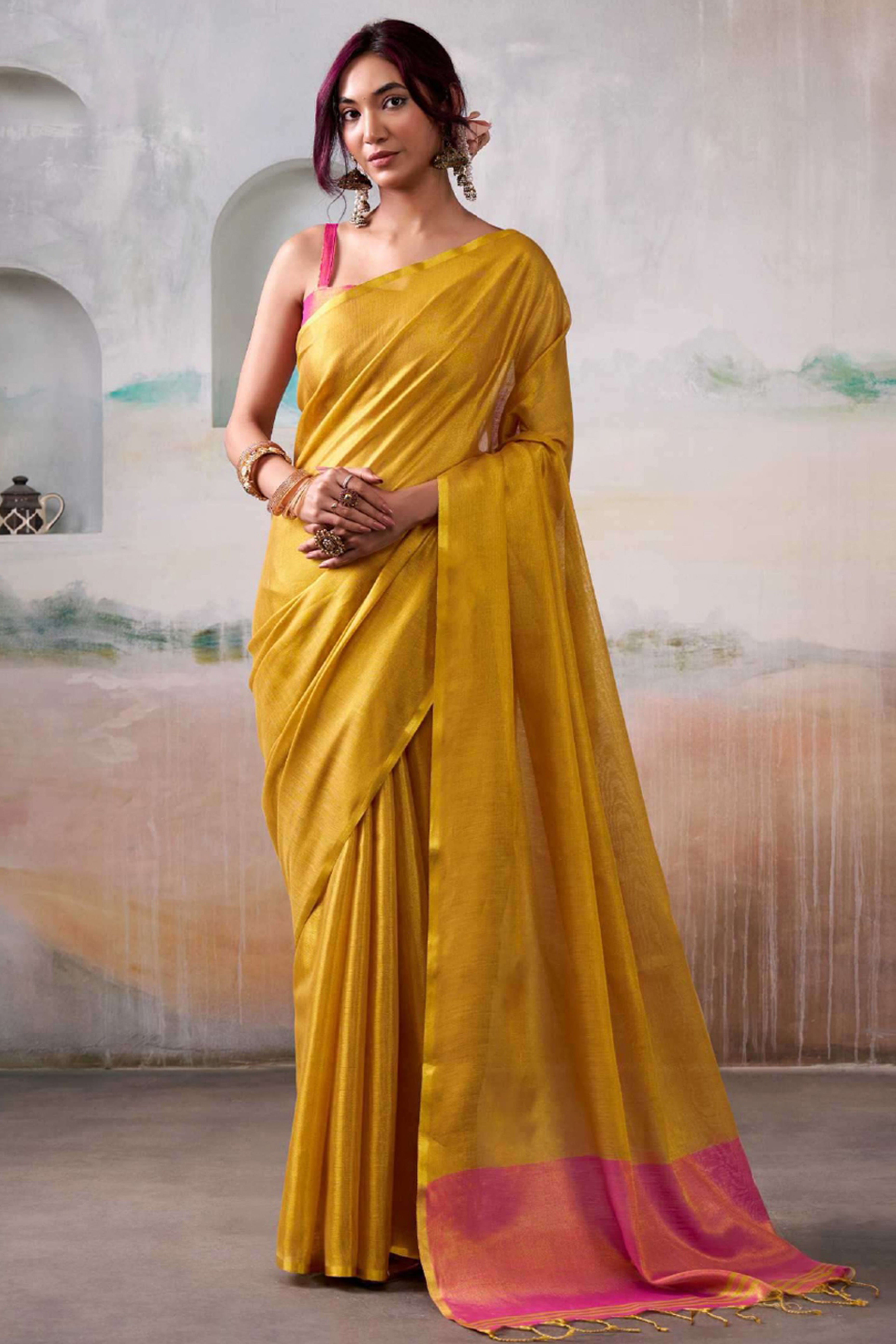 Graceful Mustard Tissue Silk Blend Saree Adorned with Intricate Zari Weaving & Tassel Pallu