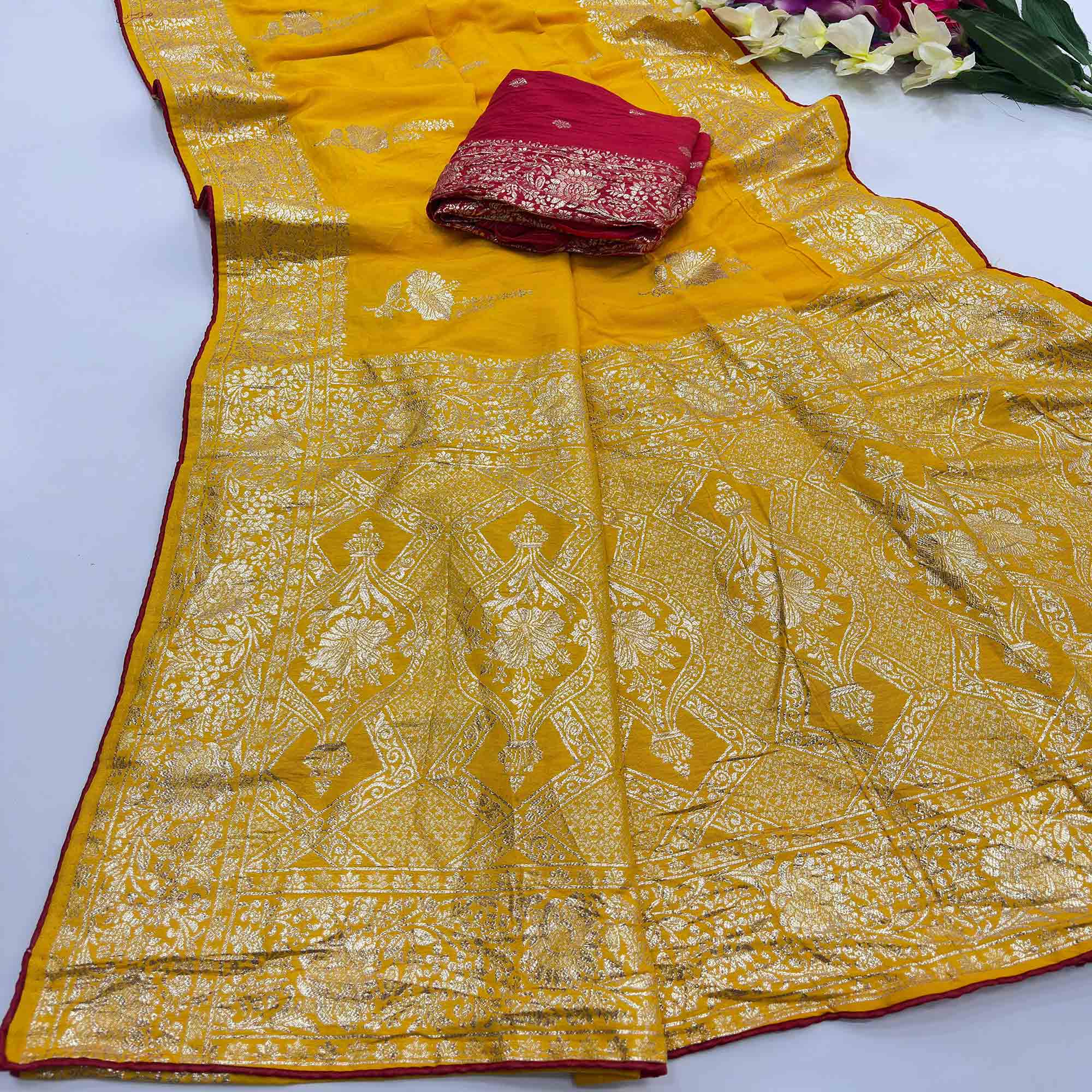 Yellow Traditional Muslin Soft Saree Featuring Luxurious Meenakari Zari Patterns