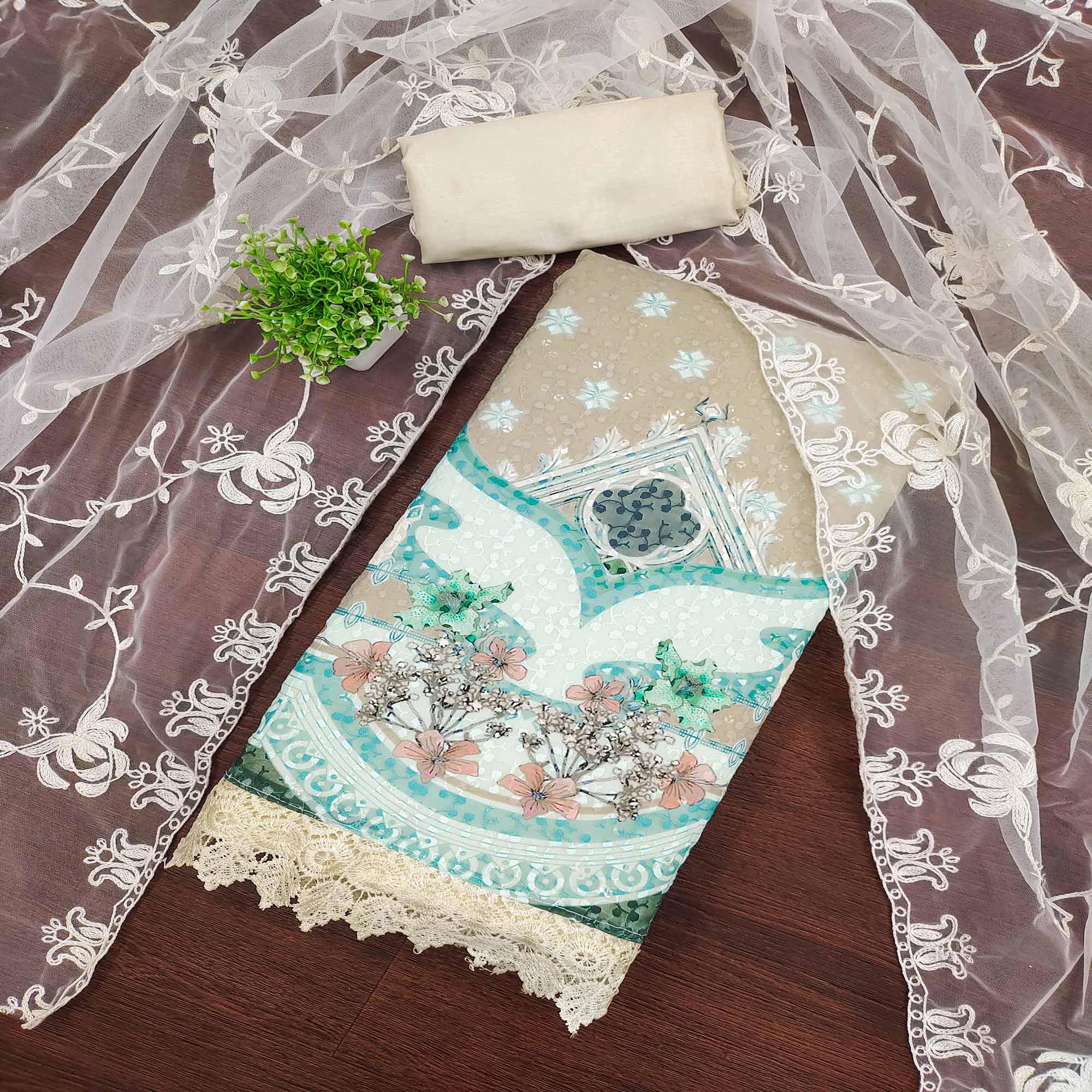 Cream & Beige Georgette Suit Fabric Adorned with Elegant and Delicate Schiffli Embroidery