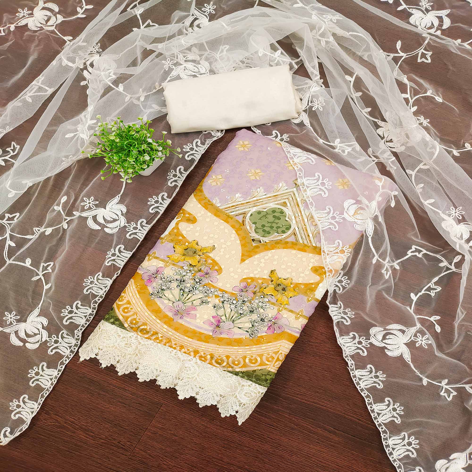 Cream & Lavender Georgette Suit Fabric Adorned with Elegant and Delicate Schiffli Embroidery