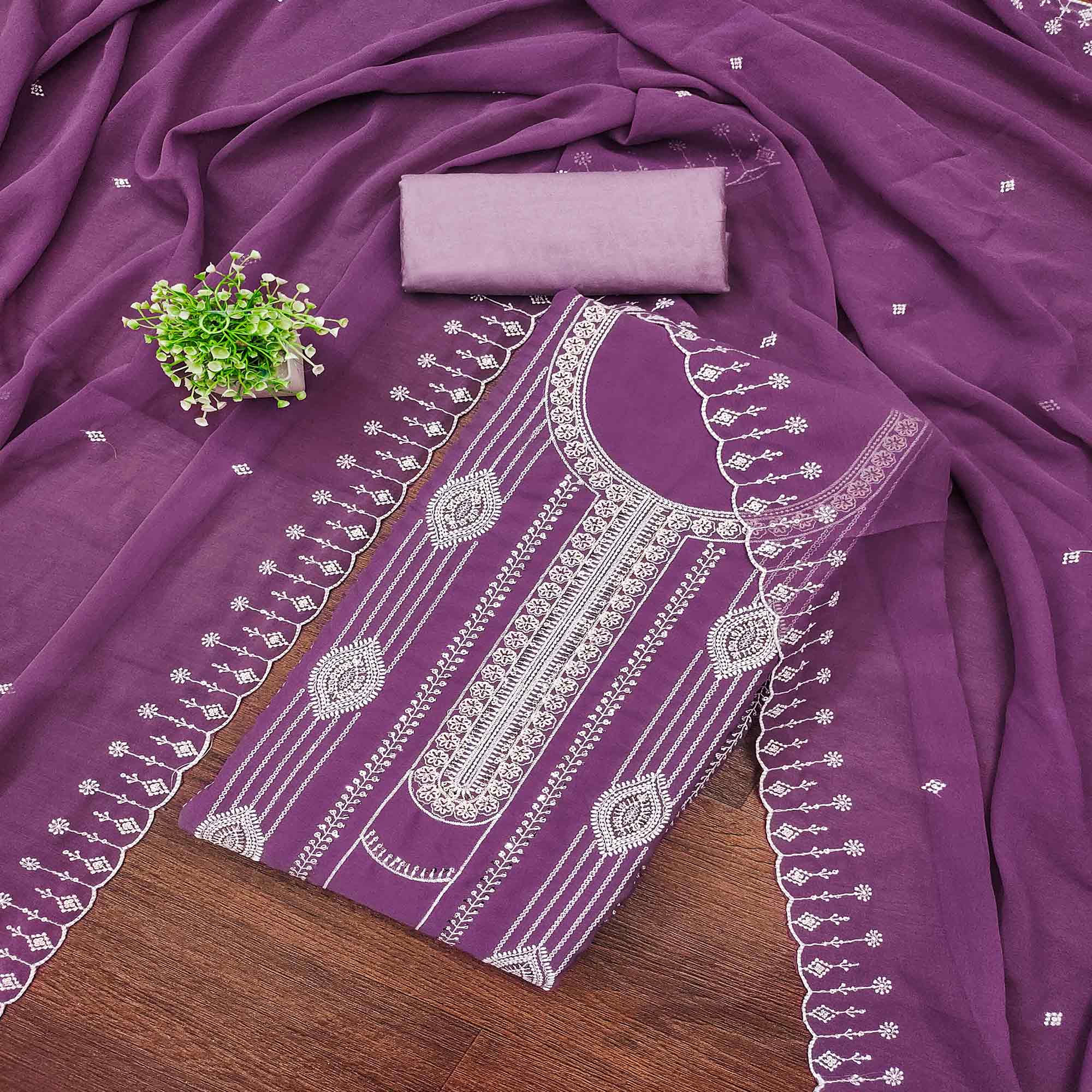 Mauve Star Georgette Suit Fabric Highlighted with Fine Thread Embroidery Work