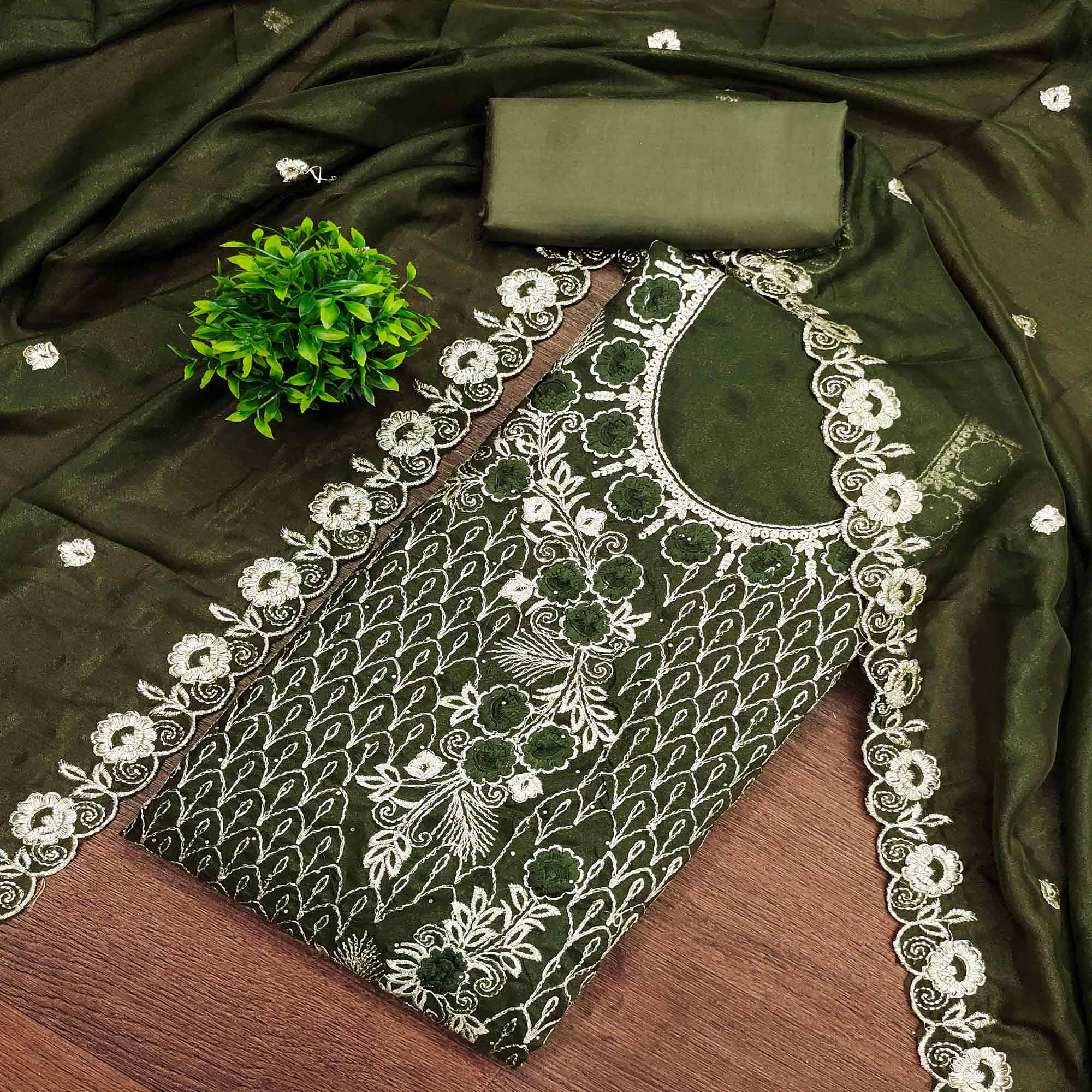 Green Georgette Dress Material Decorated with Artistic Thread Embroidery Designs