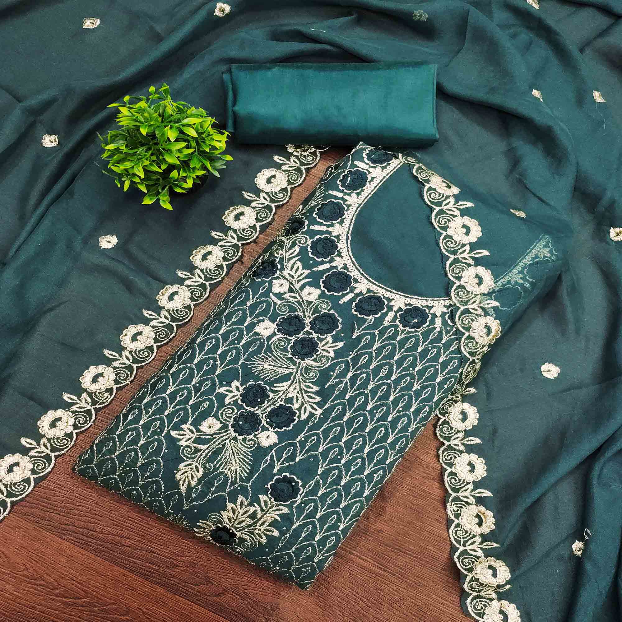 Morpich Green Georgette Dress Material Decorated with Artistic Thread Embroidery Designs