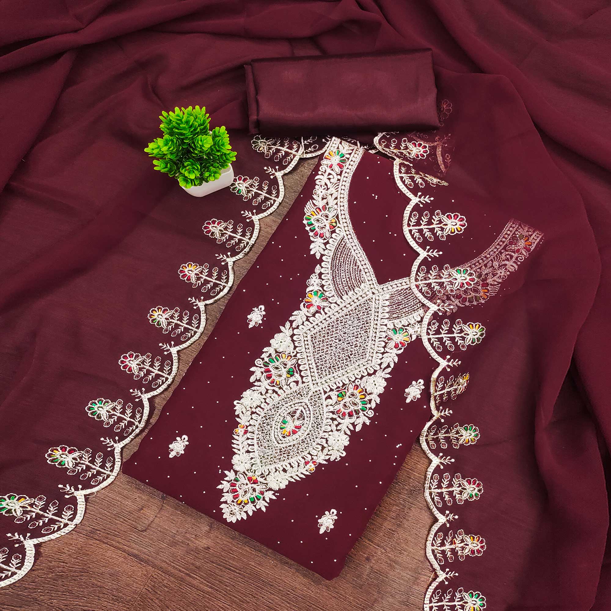 Maroon Georgette Dress Material Adorned With Elegant Floral Embroidery & Shimmering Swarovski Work