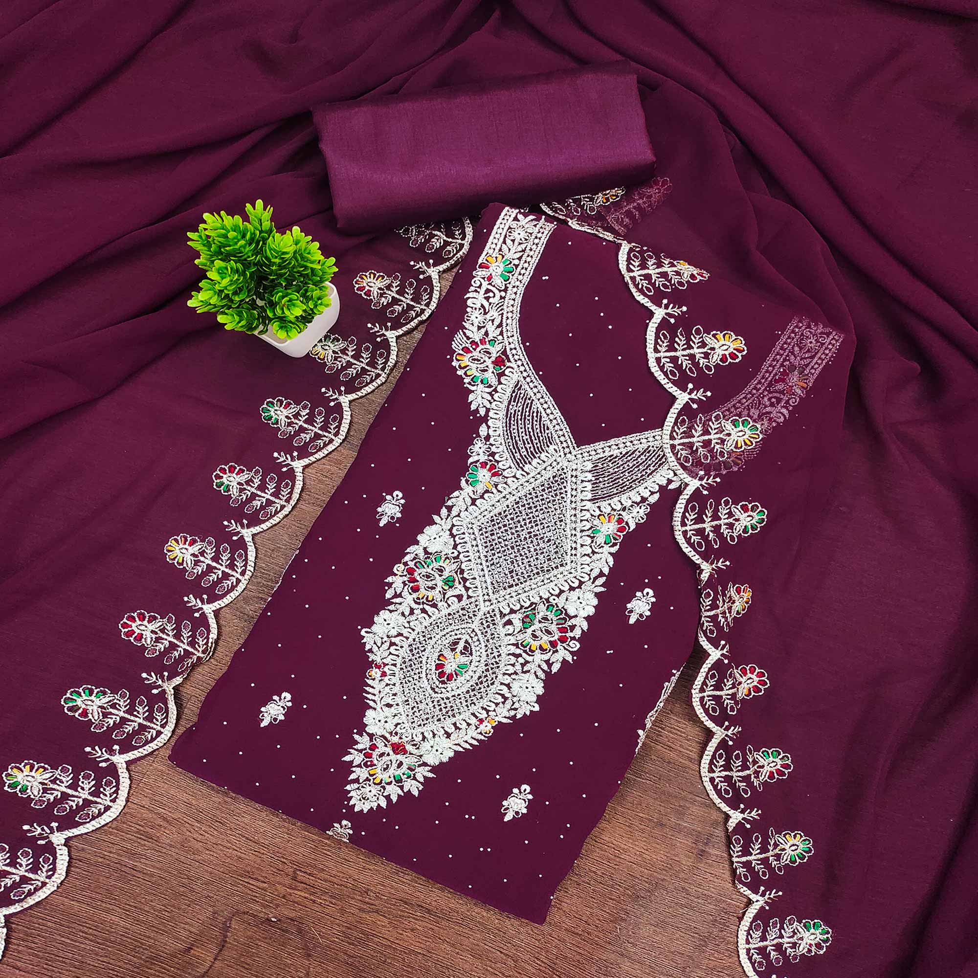 Wine Georgette Dress Material Adorned With Elegant Floral Embroidery & Shimmering Swarovski Work