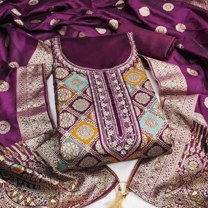 Wine Unstitched Dress Material in Zari Woven Jacquard