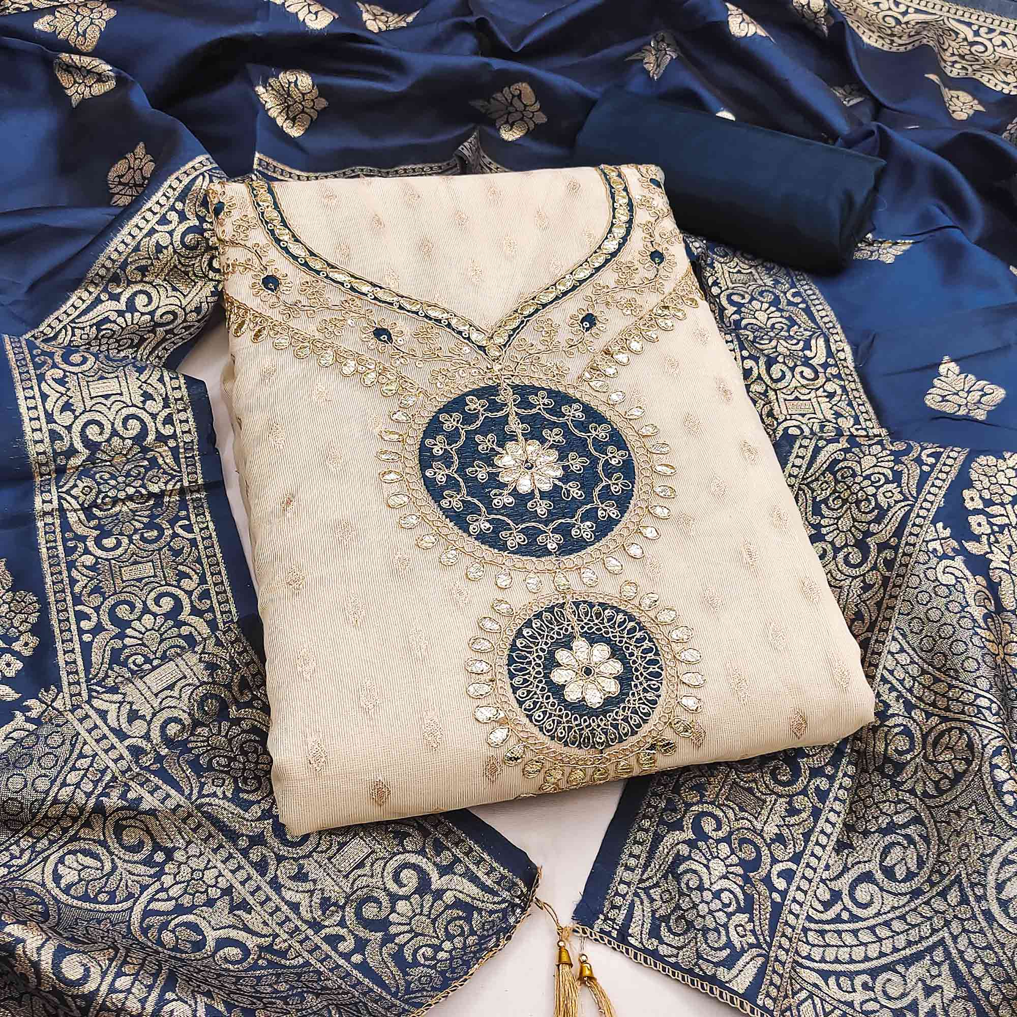 Cream & Blue Shimmer Dress Material Featuring Intricate Zari Weaving With Cording Embroidery