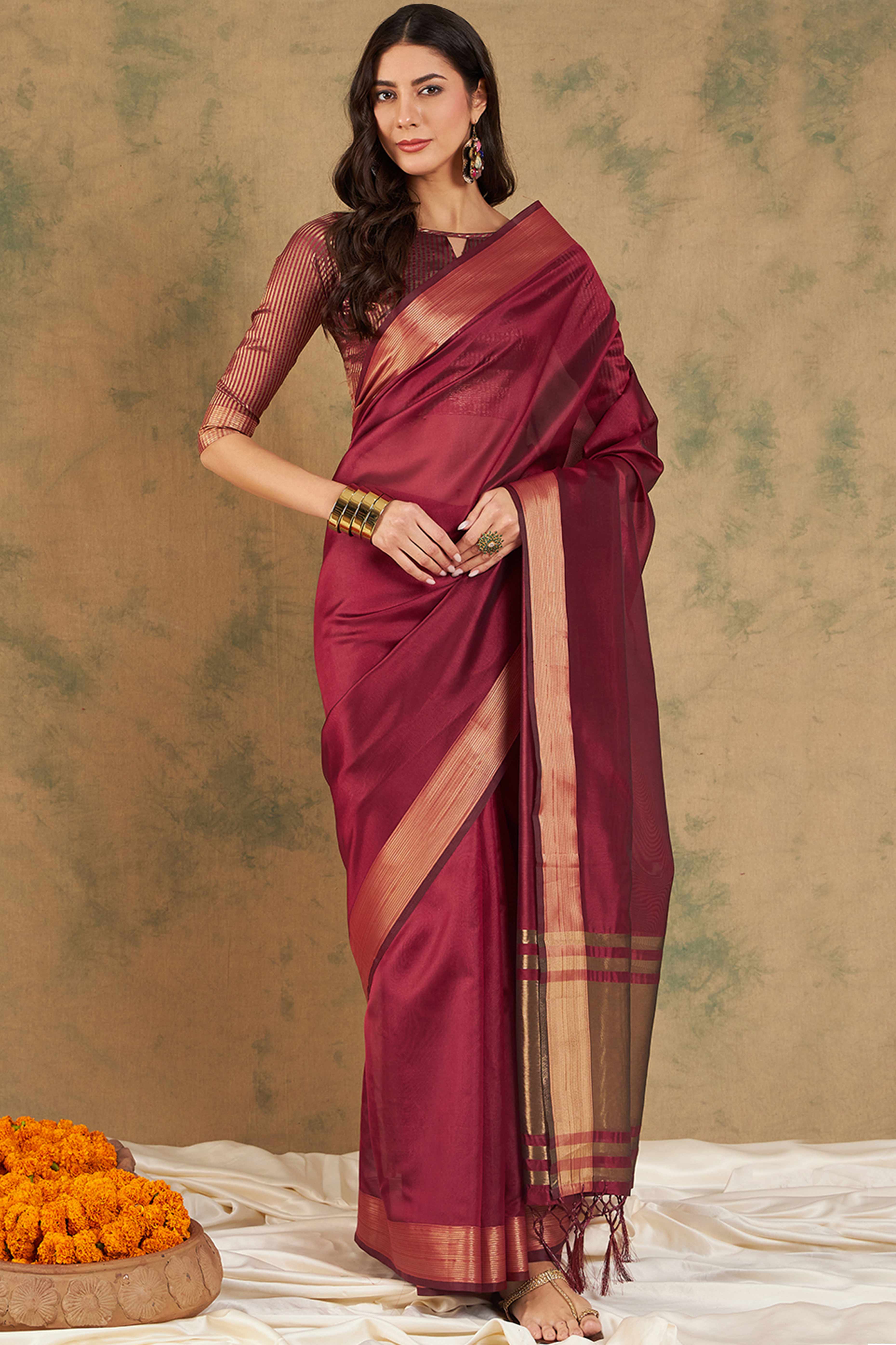 Maroon Organza Saree In Organza With Delicate Weaving Border And Tassel Details