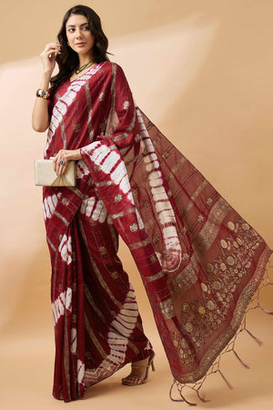 Maroon Floral Woven Staple Cotton Blend Saree Highlighted With Sequins Embroidery & Tasselled Pallu