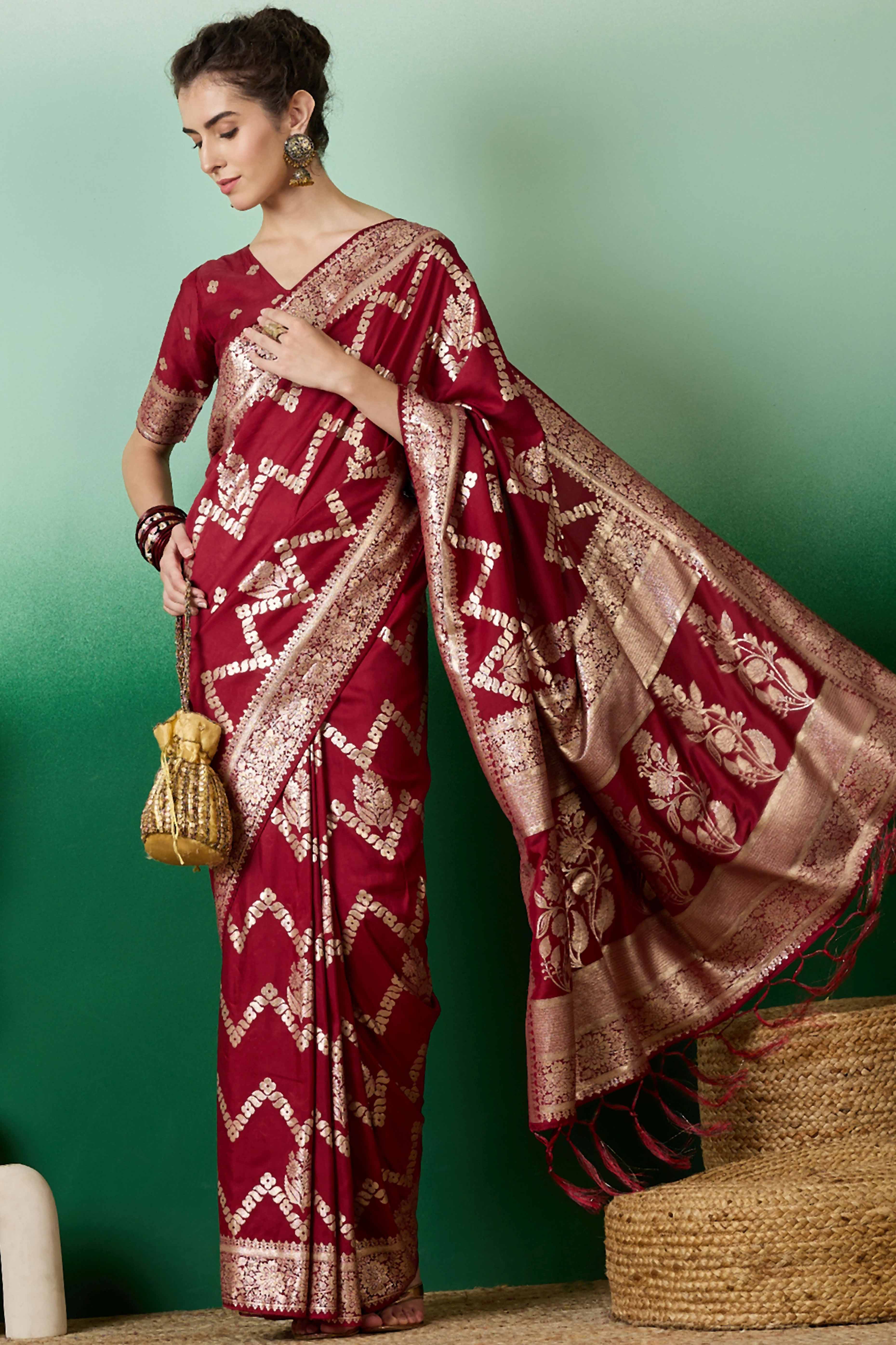Maroon Cotton Blend Jacquard Saree Adorned With Floral Weaving & Graceful Tassel Pallu