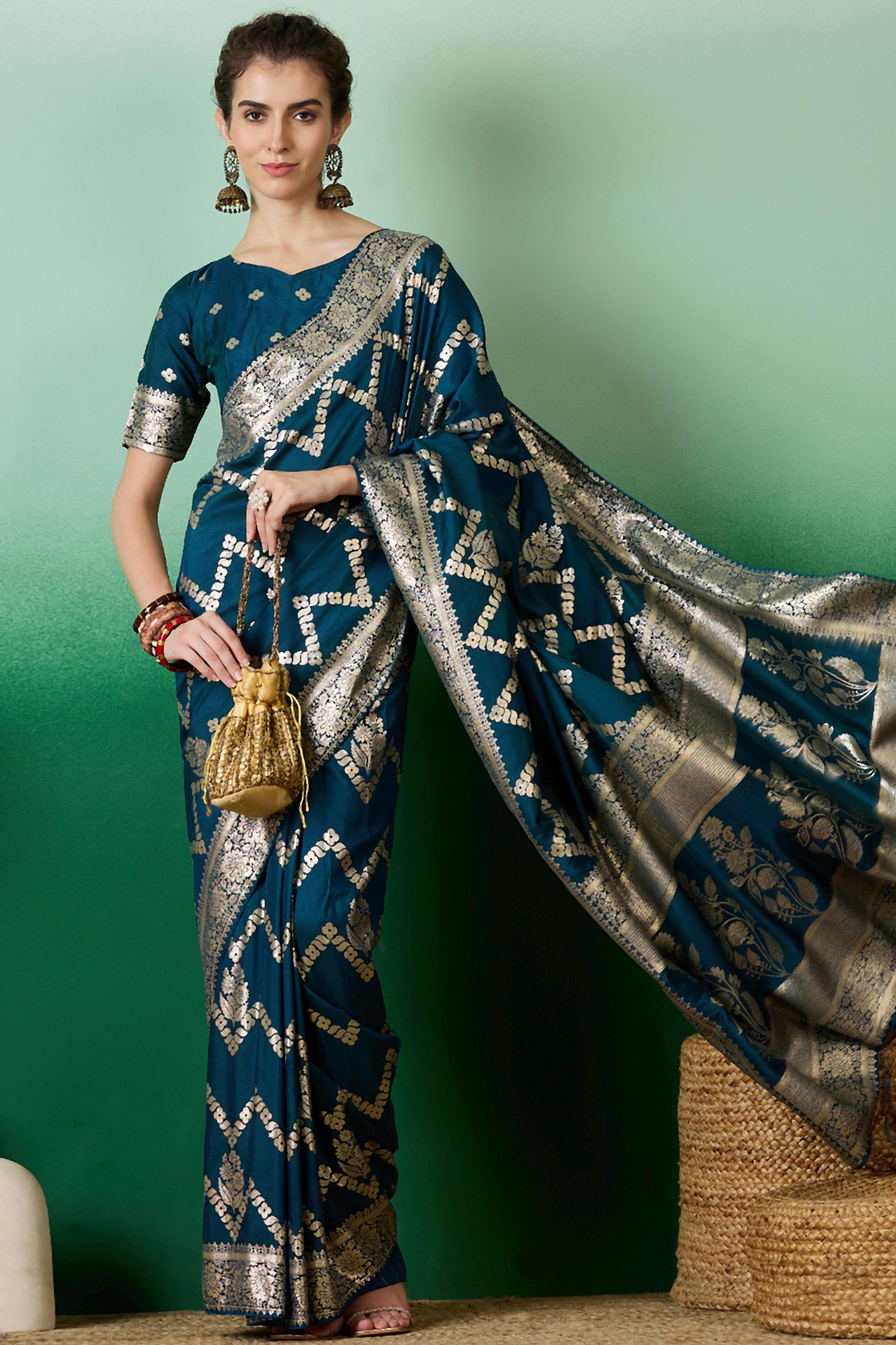 Rich Teal Blue Cotton Blend Jacquard Saree Adorned With Floral Weaving & Graceful Tassel Pallu