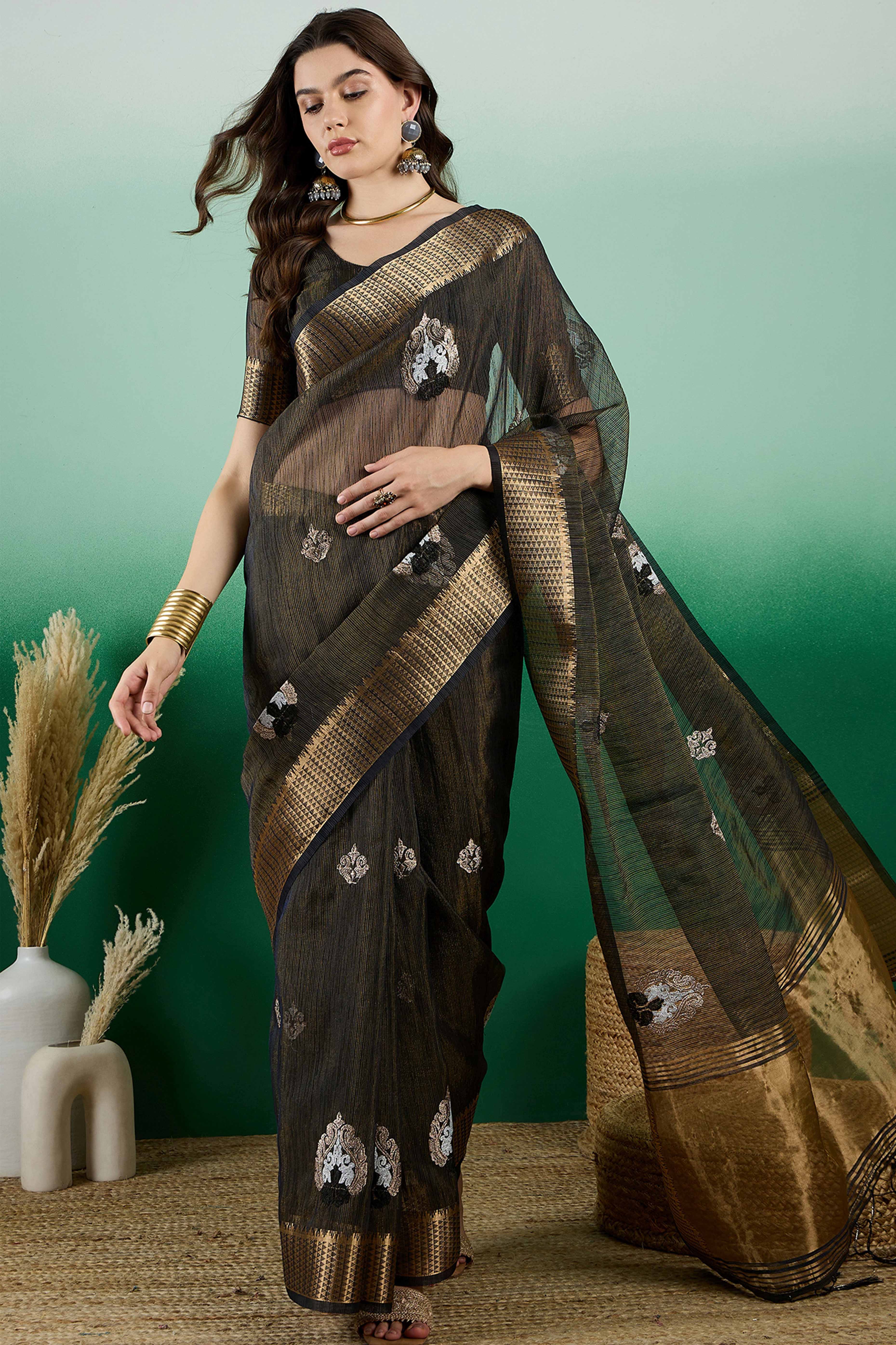 Black Khadi Organza Saree Adorned With Elegant Embroidery & Tassel Pallu