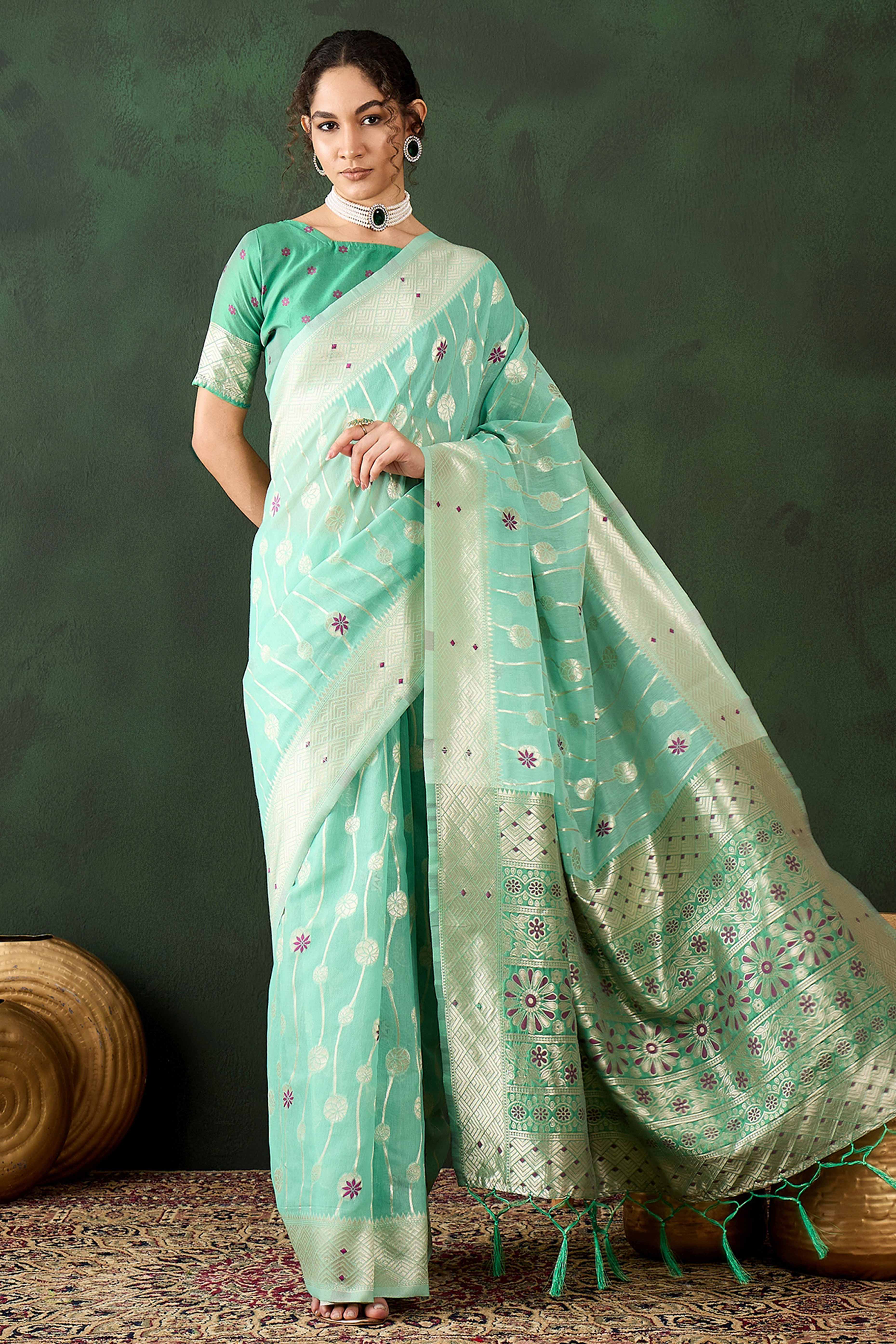 Sea Green Cotton Blend Saree Adorned With Intricate Floral Zari Weaving & A Stylish Tassel Pallu