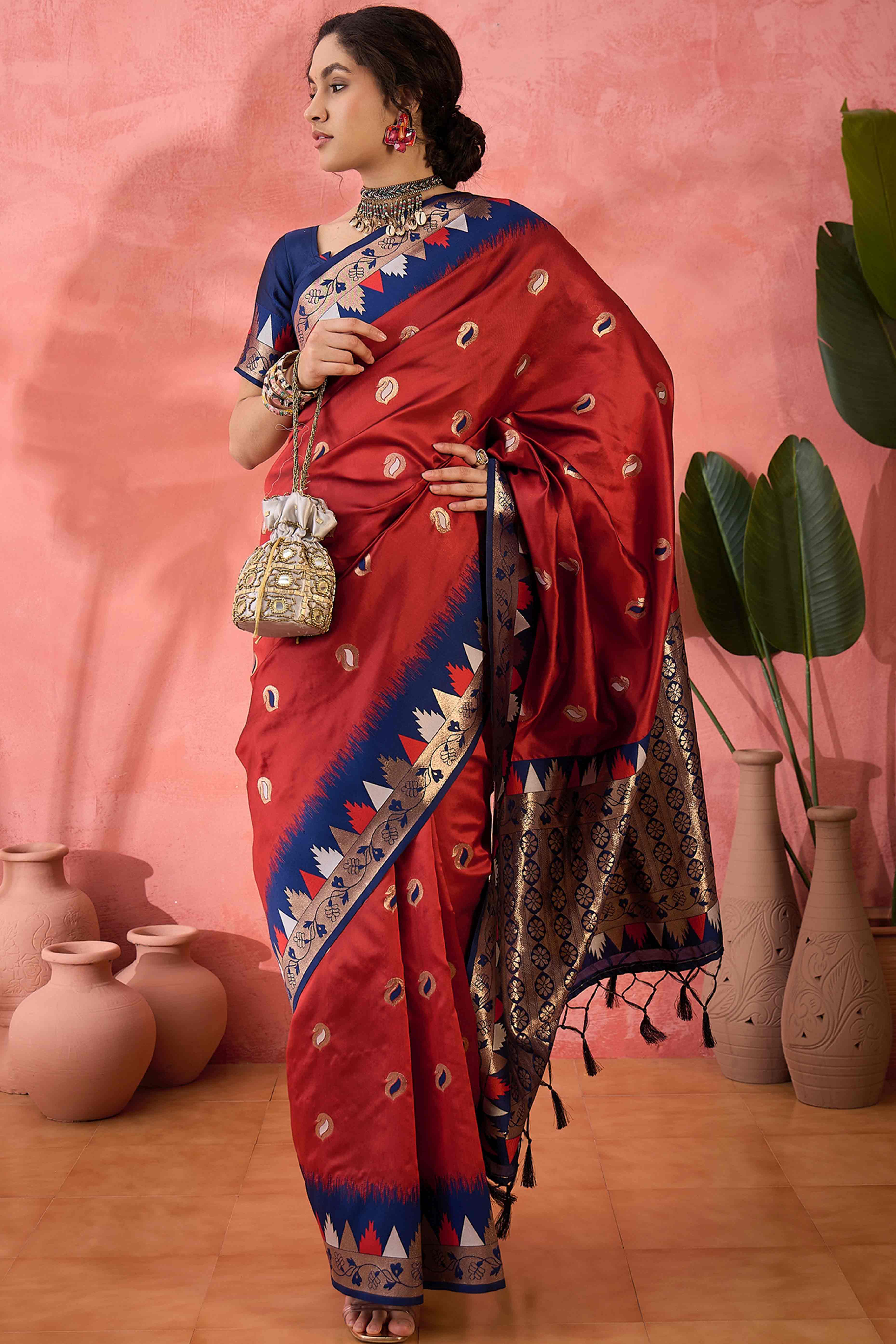 Maroon Zari Woven Poly Silk Saree Enhanced With Graceful Tassel Detailing