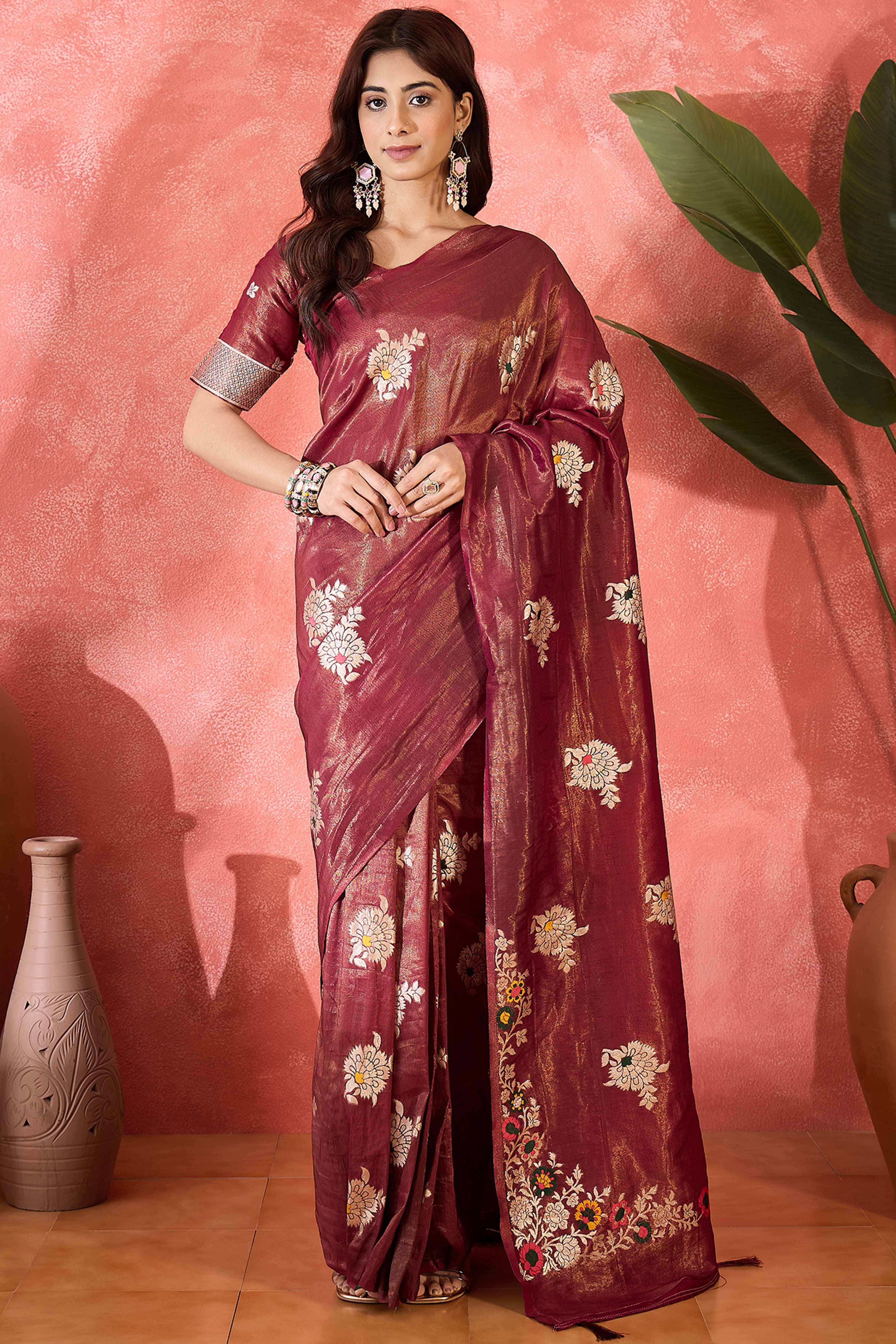 Wine Shimmer Saree Featuring Intricate Floral Zari Weaving & Tassel Finish