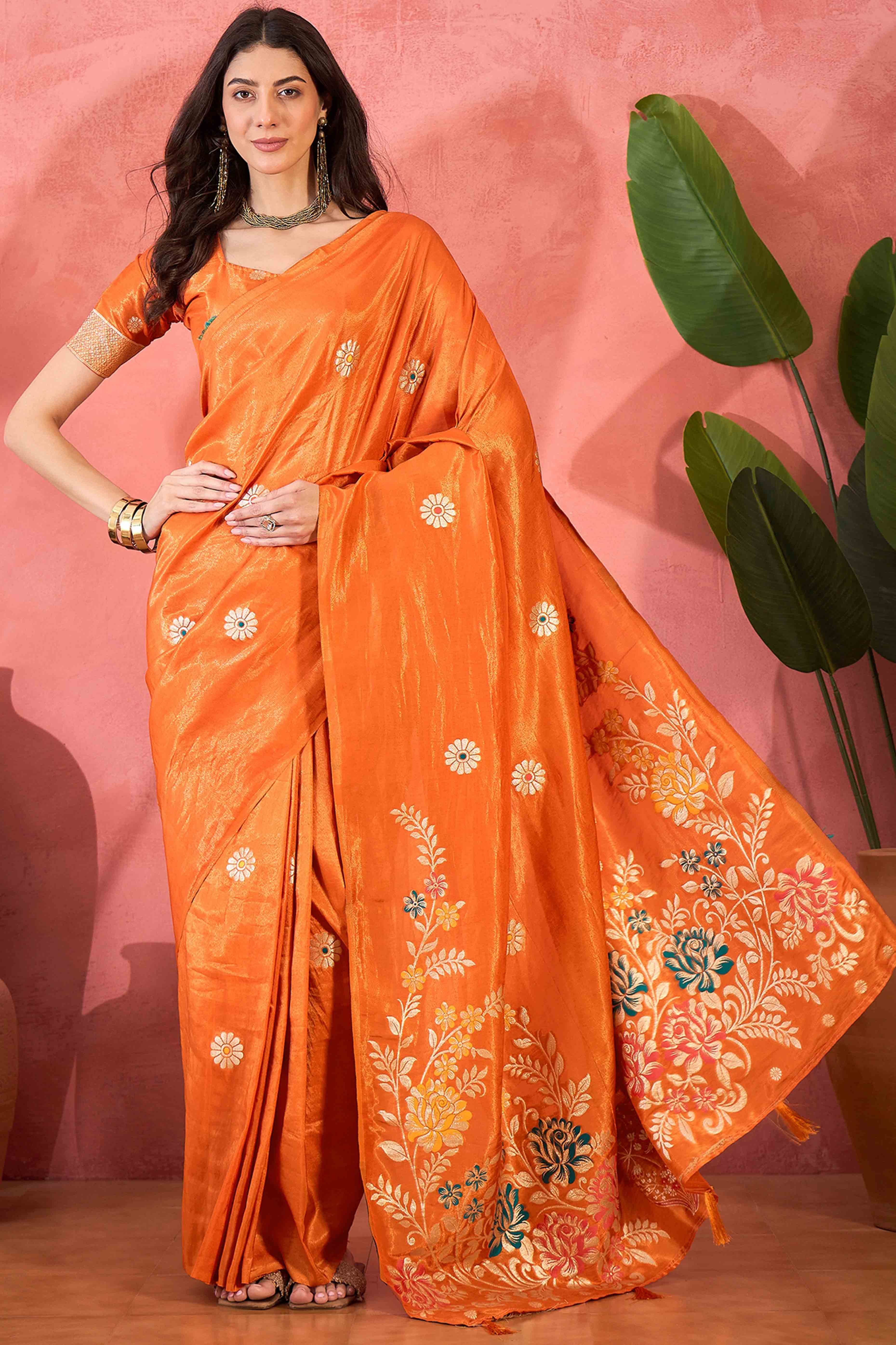 Orange Shimmer Saree Adorned with Floral Zari Weaving & Tassel Pallu