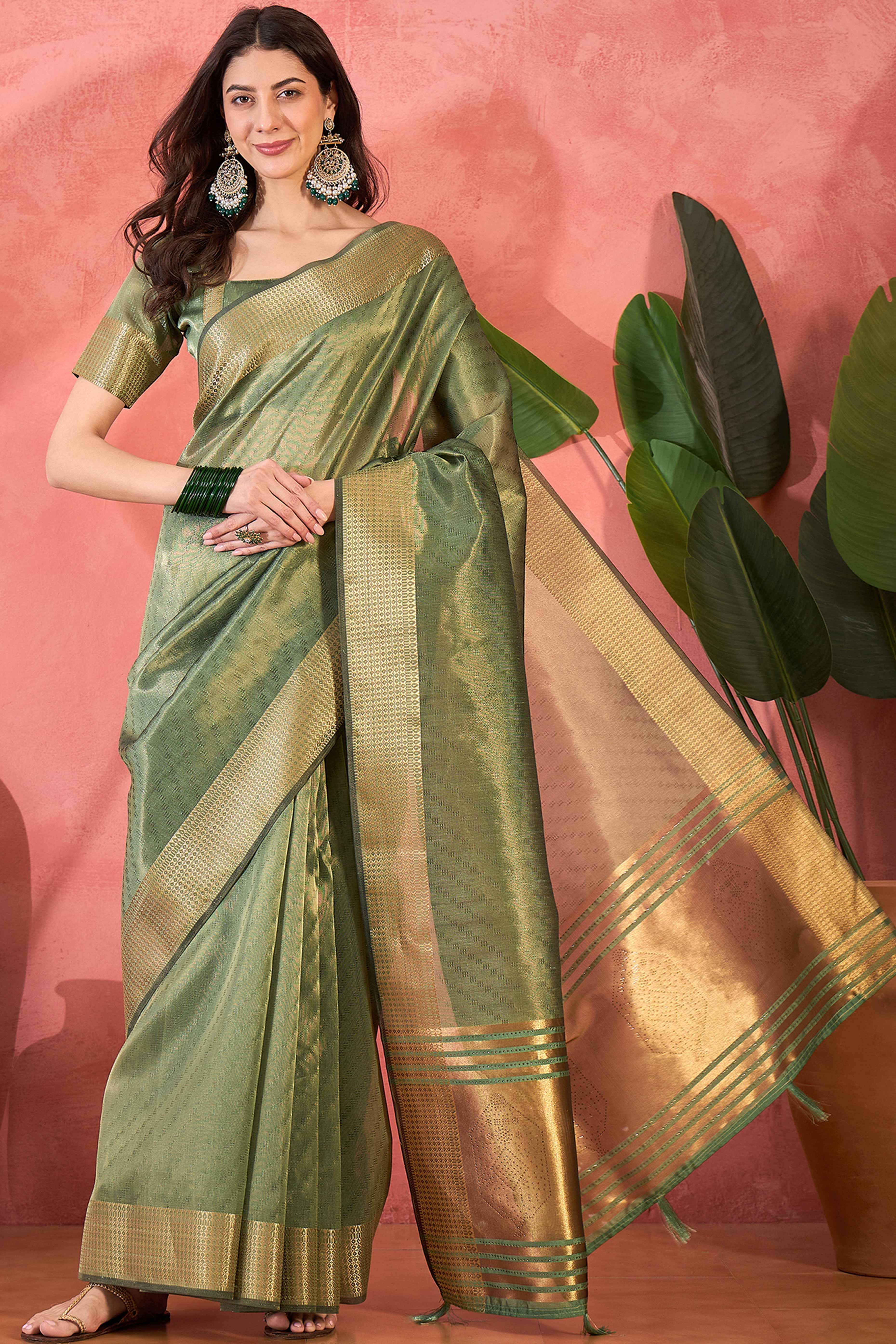 Green Khadi Organza Saree Intricate Weaving & Sparkling Stonework With Tassel Pallu