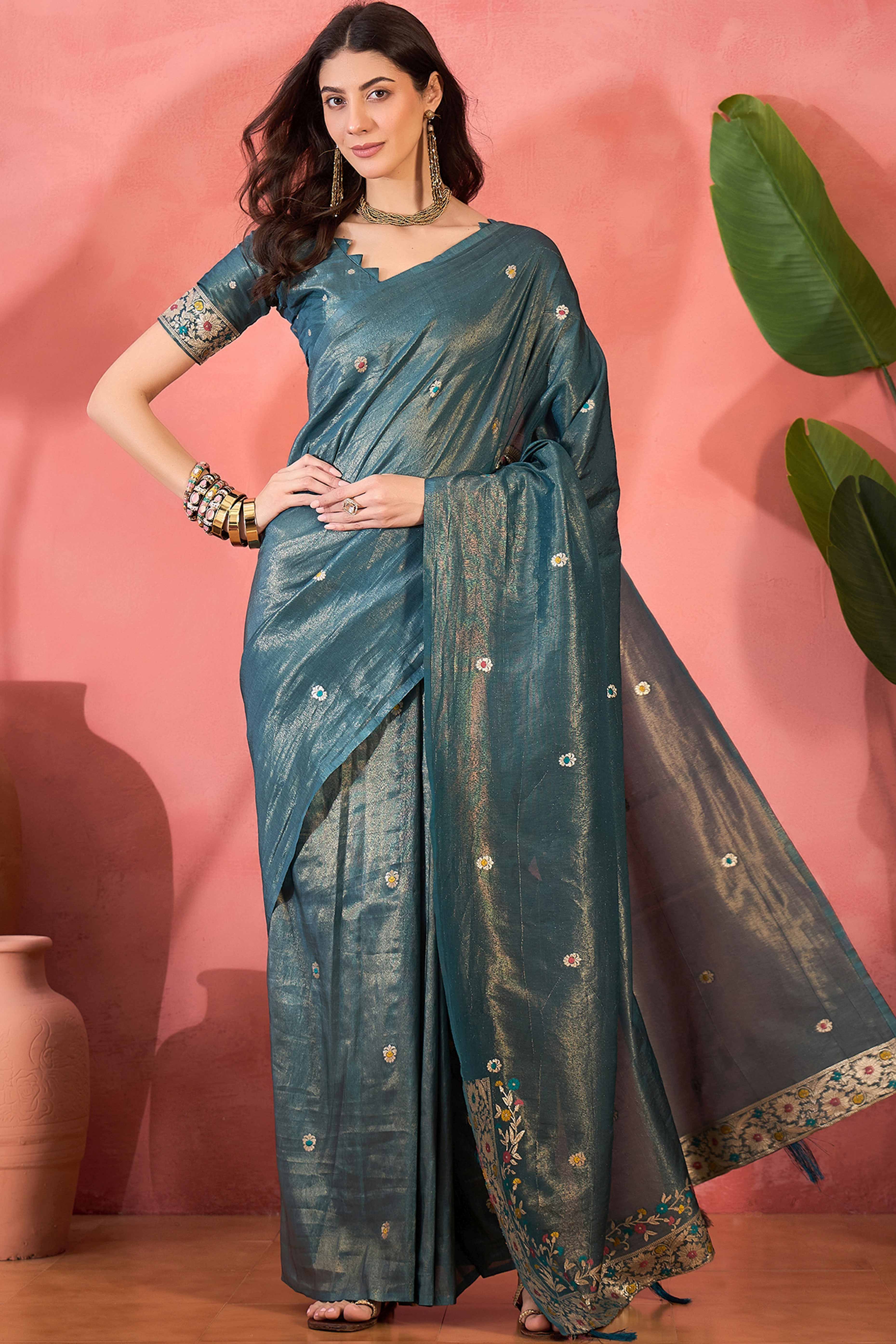 Teal Blue Zari Woven Shimmer Saree With Floral Motifs & Flowing Tassel Pallu