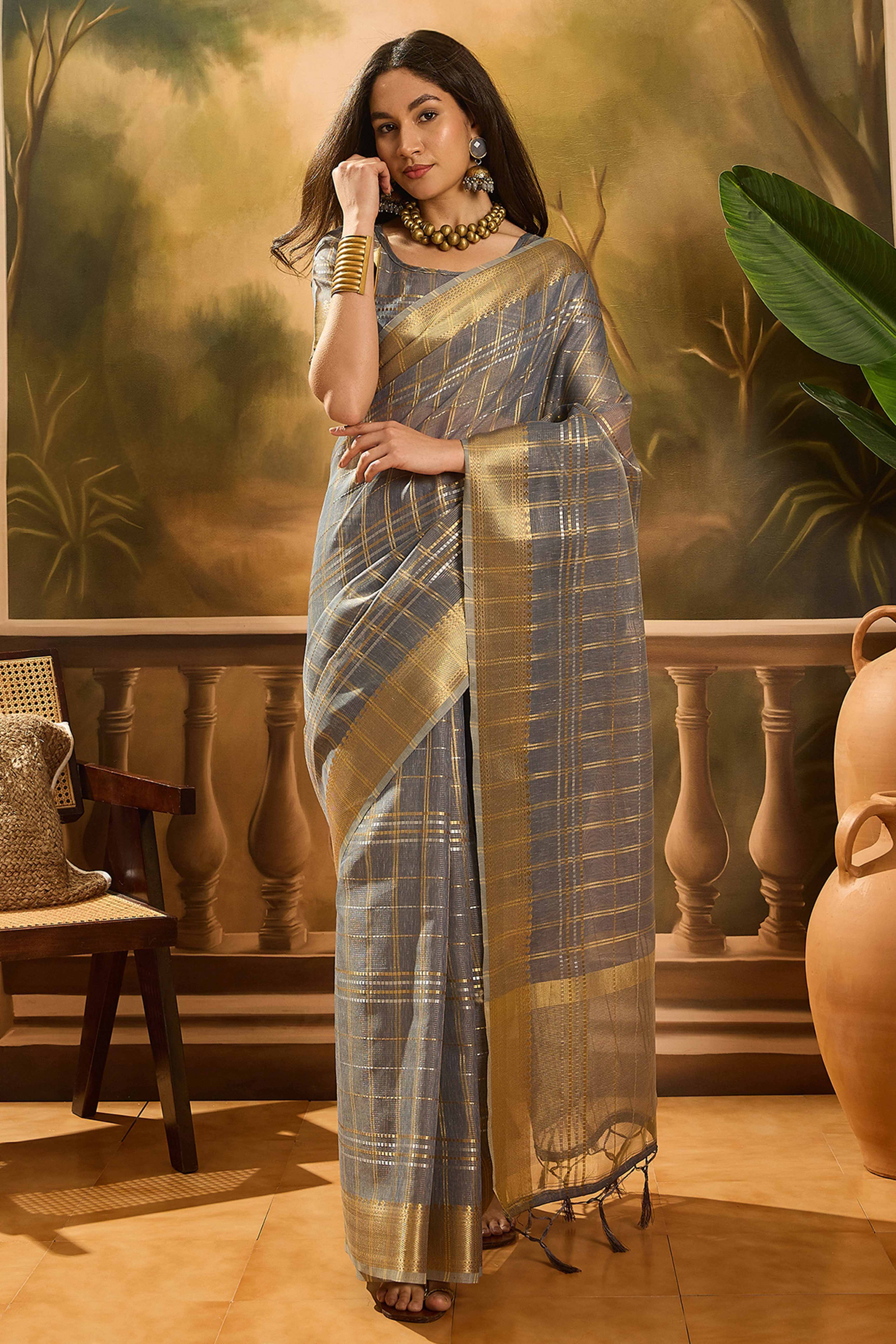 Grey Zari Woven Khadi Organza Saree Featuring Classic Checks & Tassel Detailing