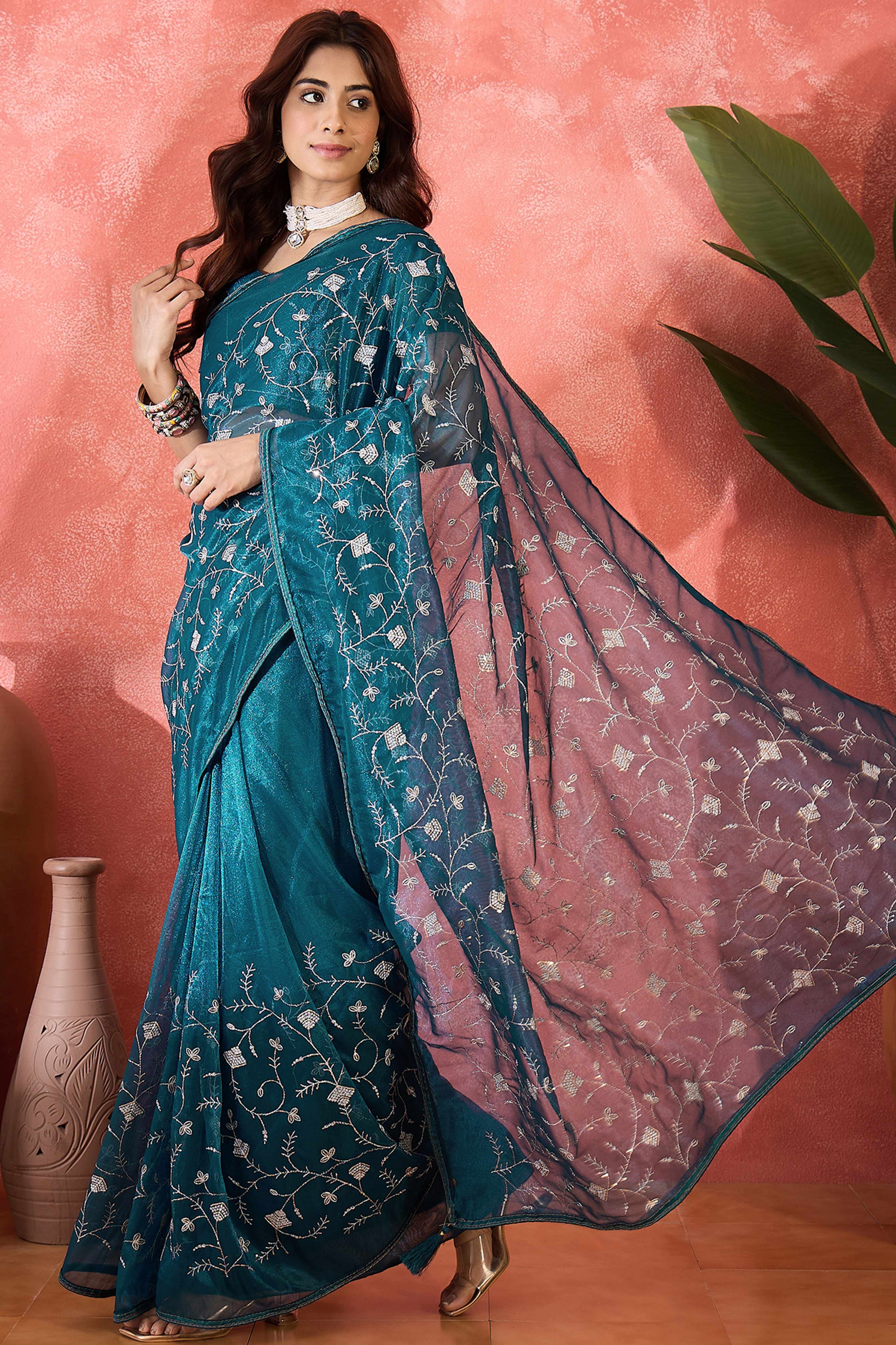 Teal Floral Sequin Embellished Saree In Twill Net With Tassel Accents