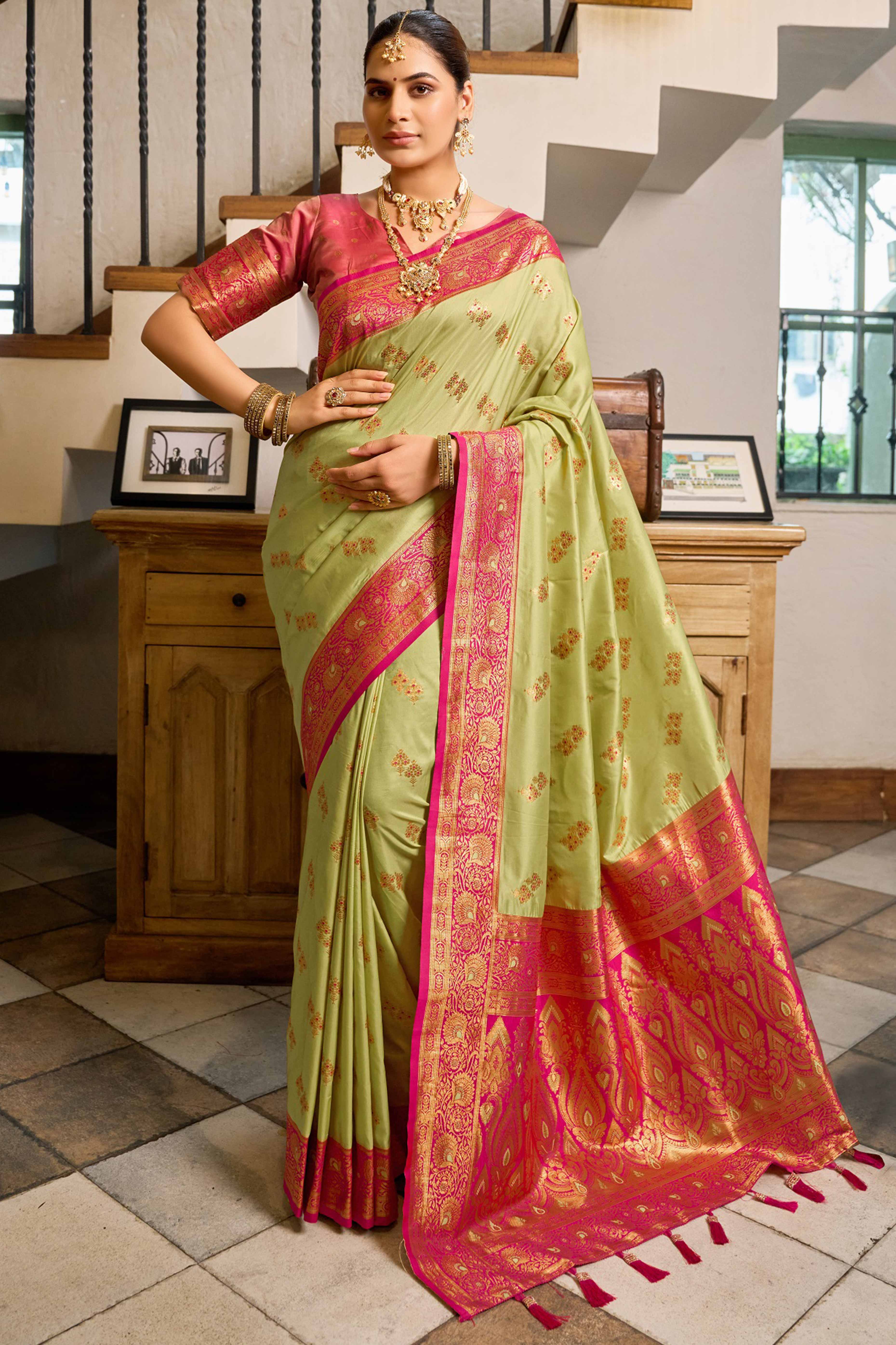 Pista Green Silk Blend Saree Featuring Intricate Floral Zari Work
