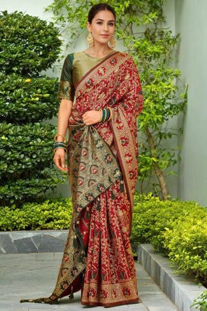 Maroon Paithani Saree In Silk Blend Highlighted With Floral Weaving & Tasselled Edge