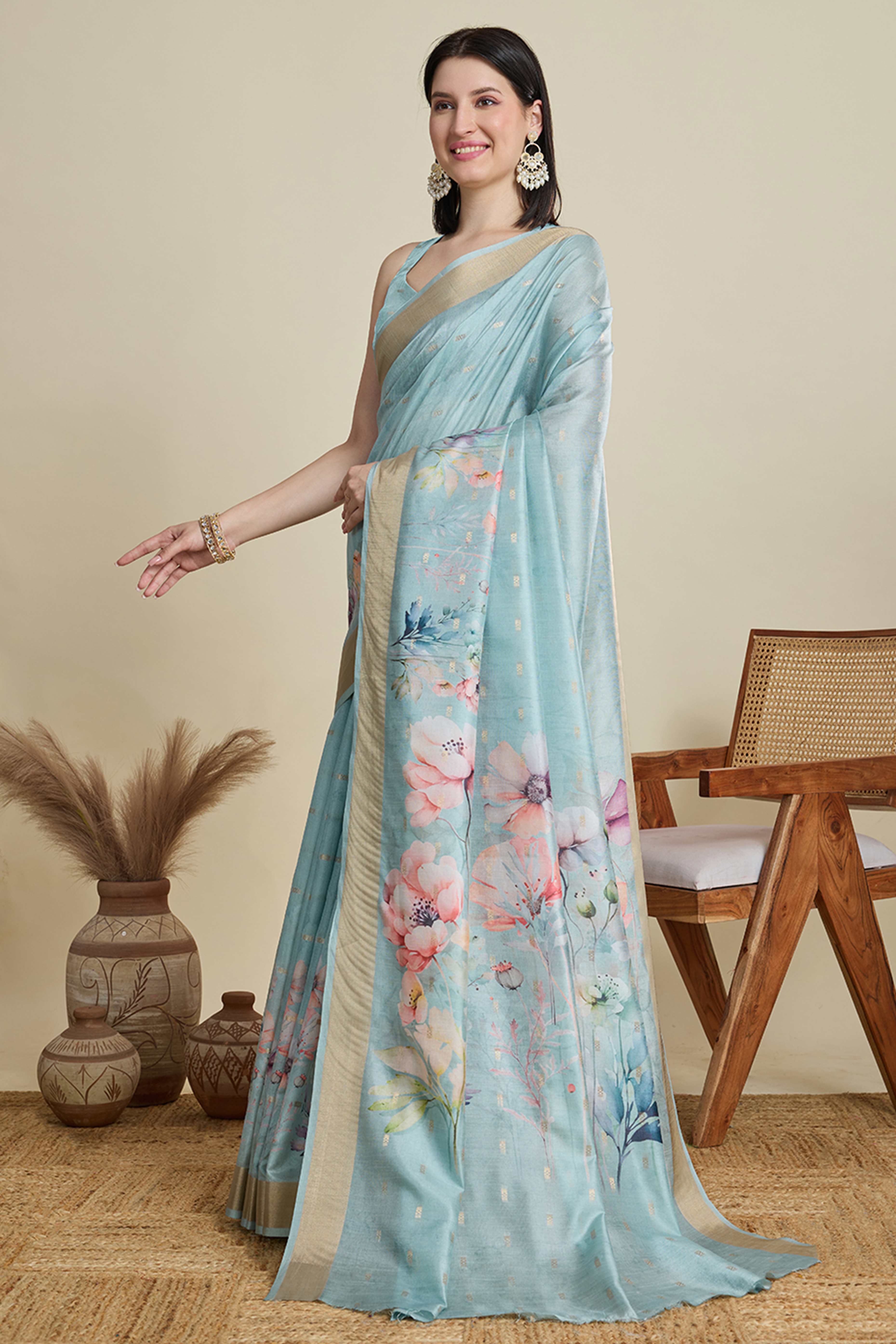 Sky Blue Cotton Blend Saree Featuring Floral Prints and a Festive Zari Border Accent