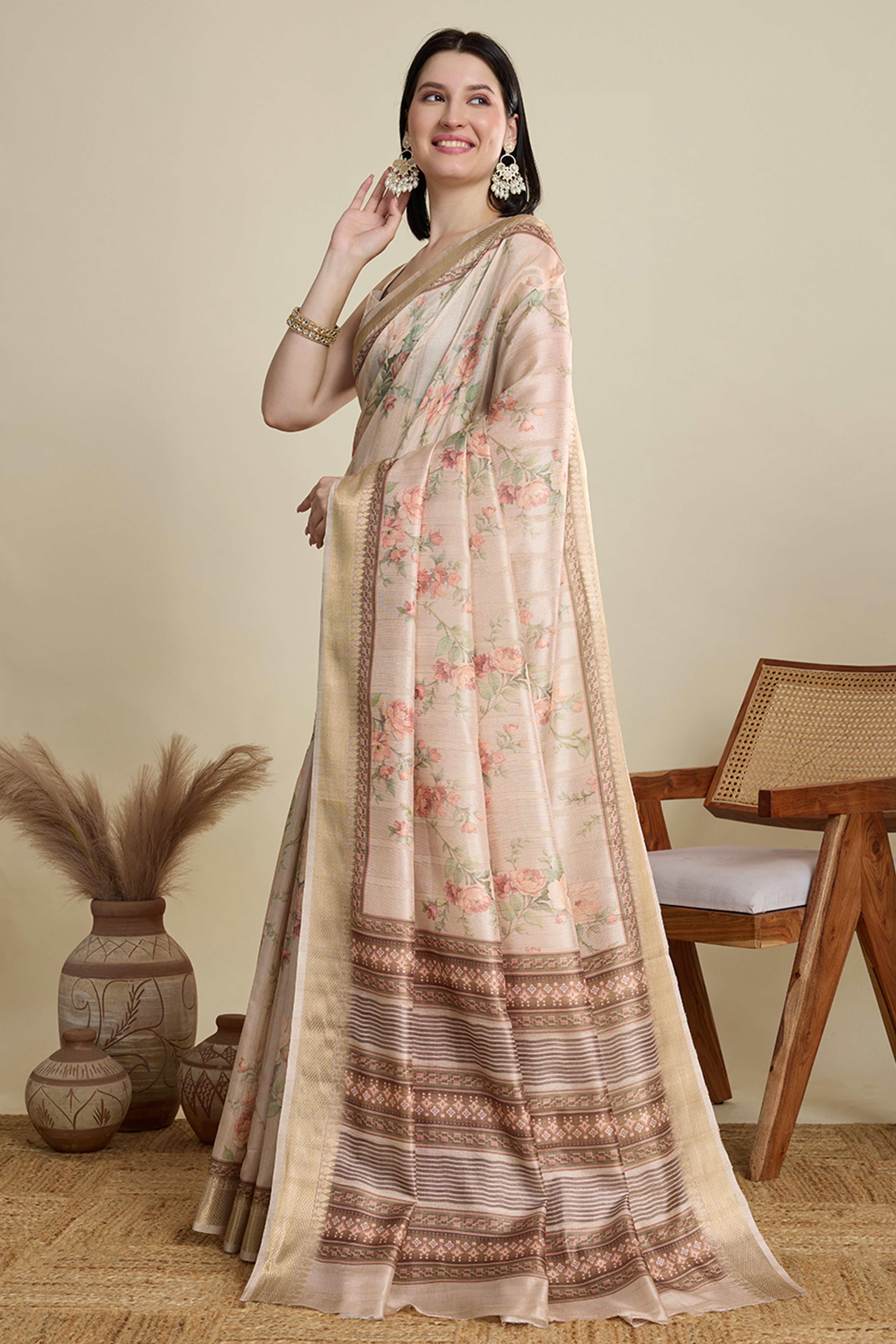 Cream Cotton Blend Saree Featuring Floral Prints and a Festive Zari Border Accent