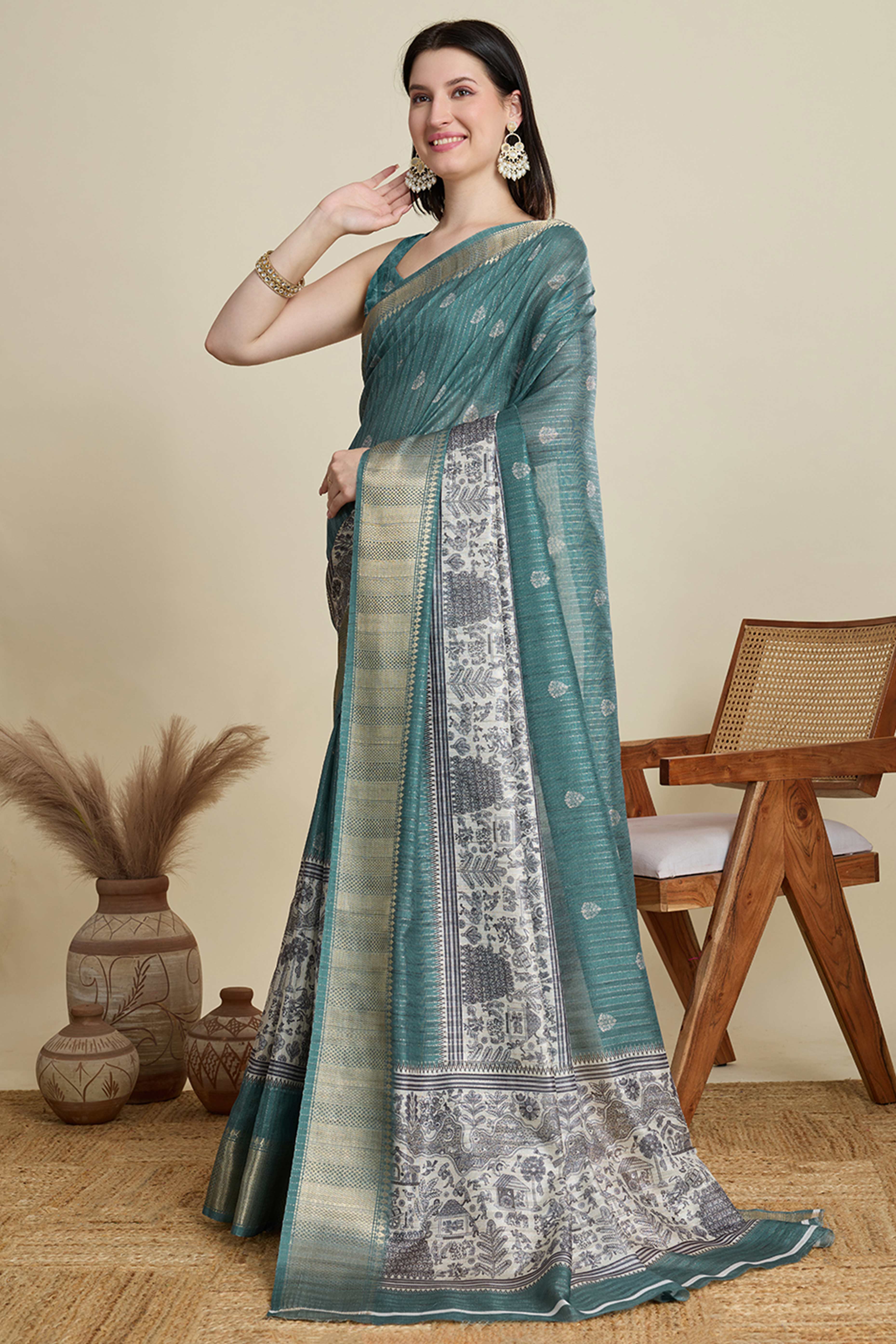 Sea Green Cotton Blend Saree Featuring Floral Prints and a Festive Zari Border Accent