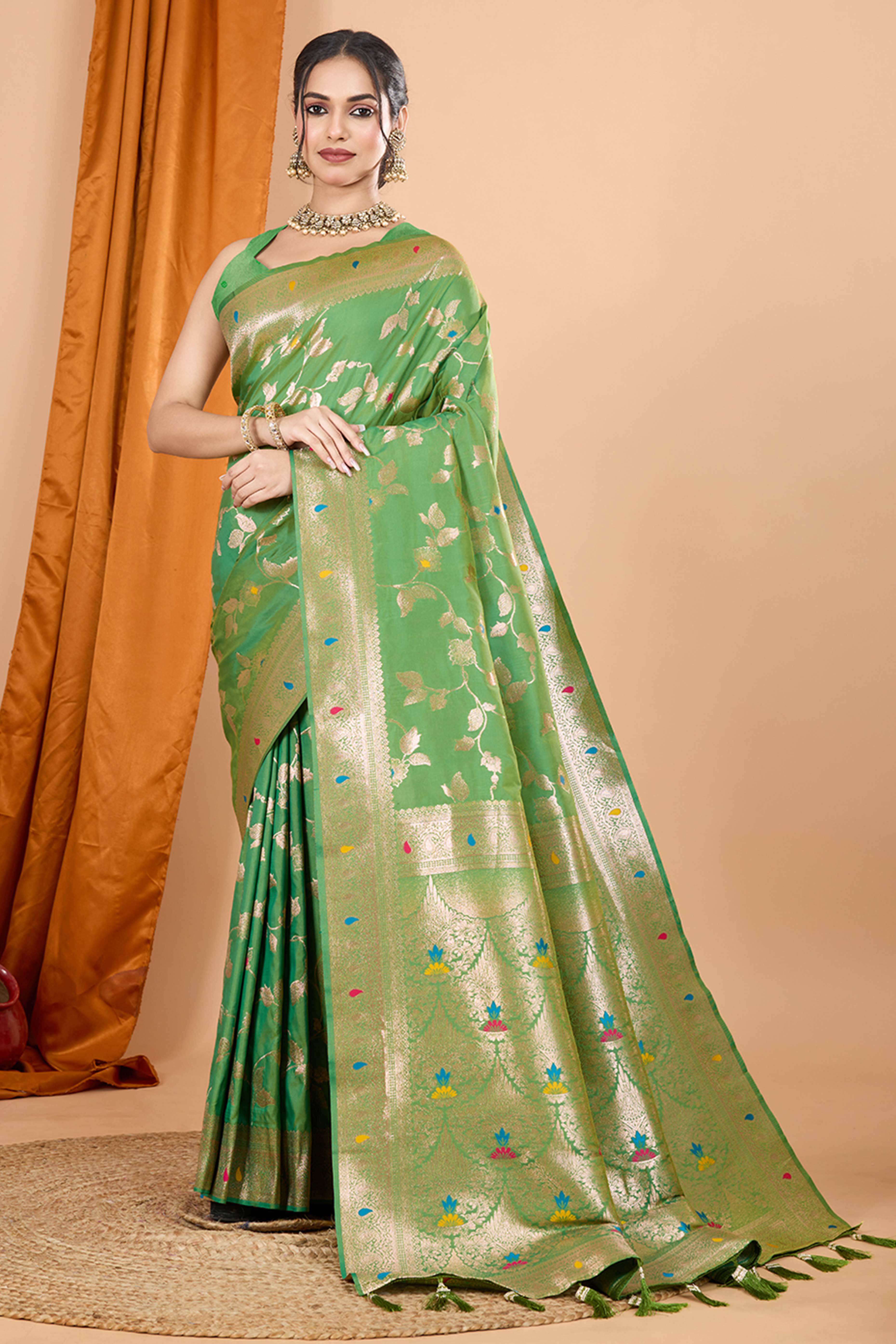 Green Banarasi Silk Saree With Exquisite Floral Zari Weaving and Elegant Tassels