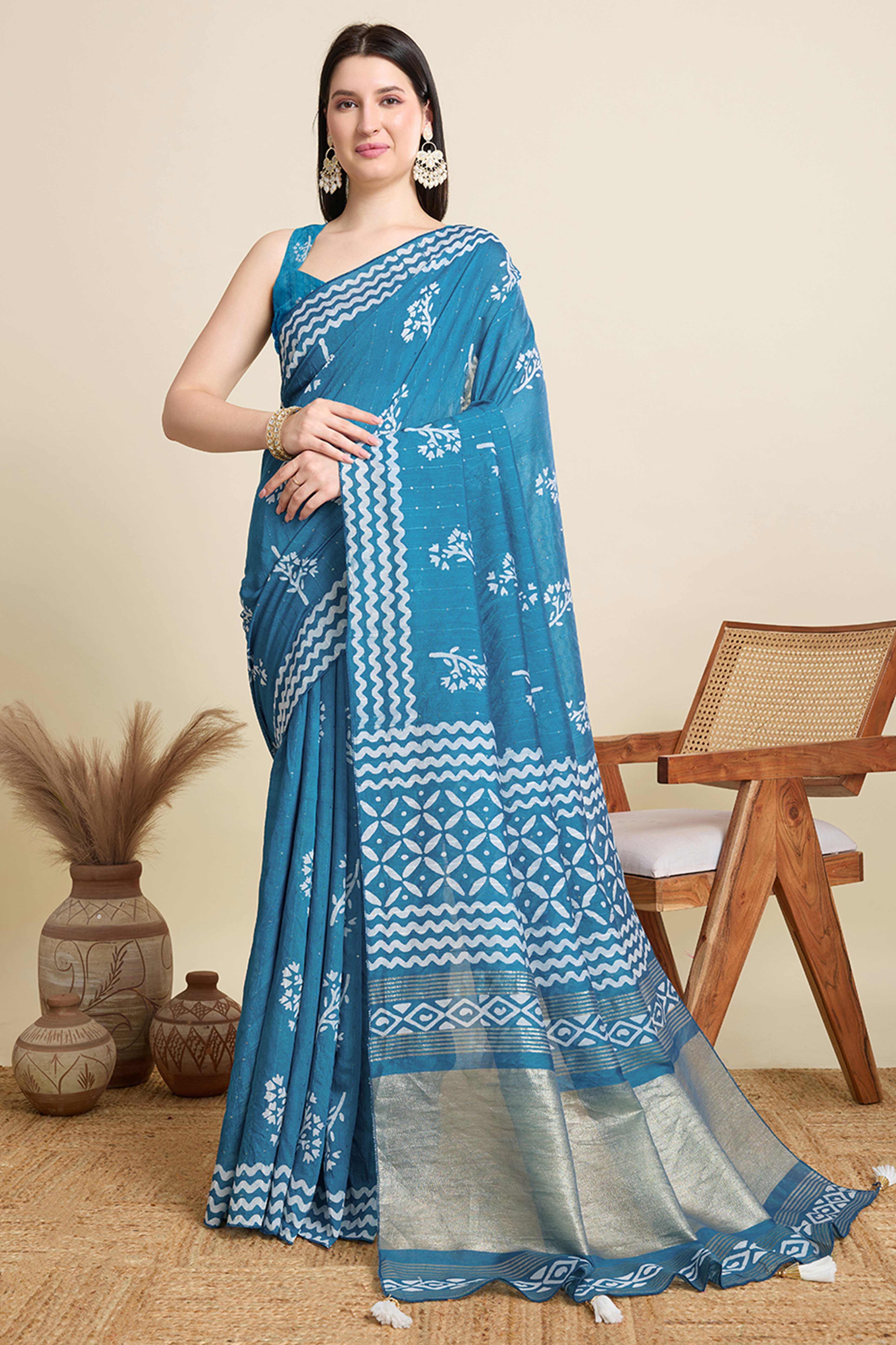 Blue Cotton Blend Saree Featuring Floral Prints and Elegant Sequins Work Accents